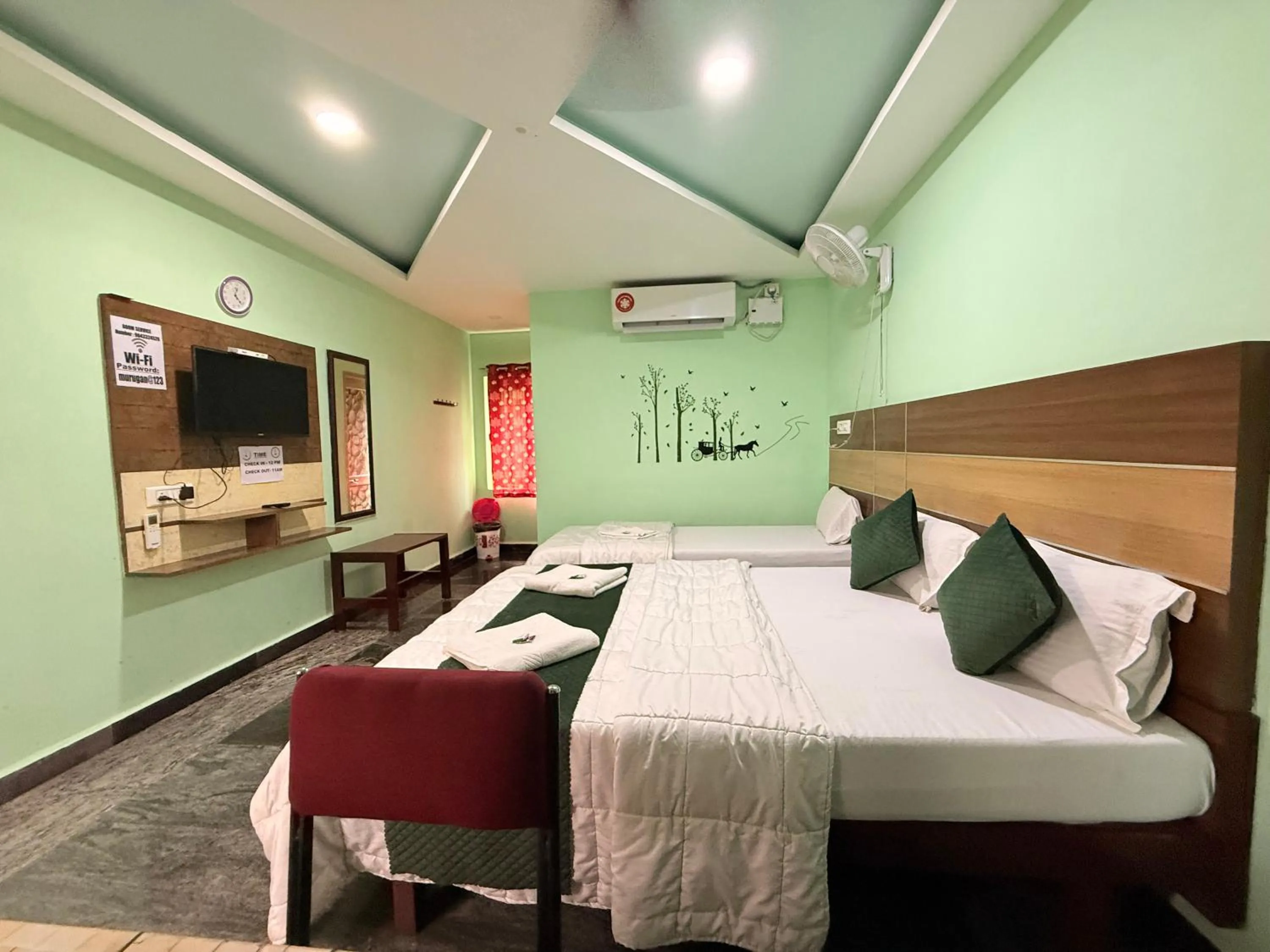 Bed in Sri Murugan Beach Paradise Hotel