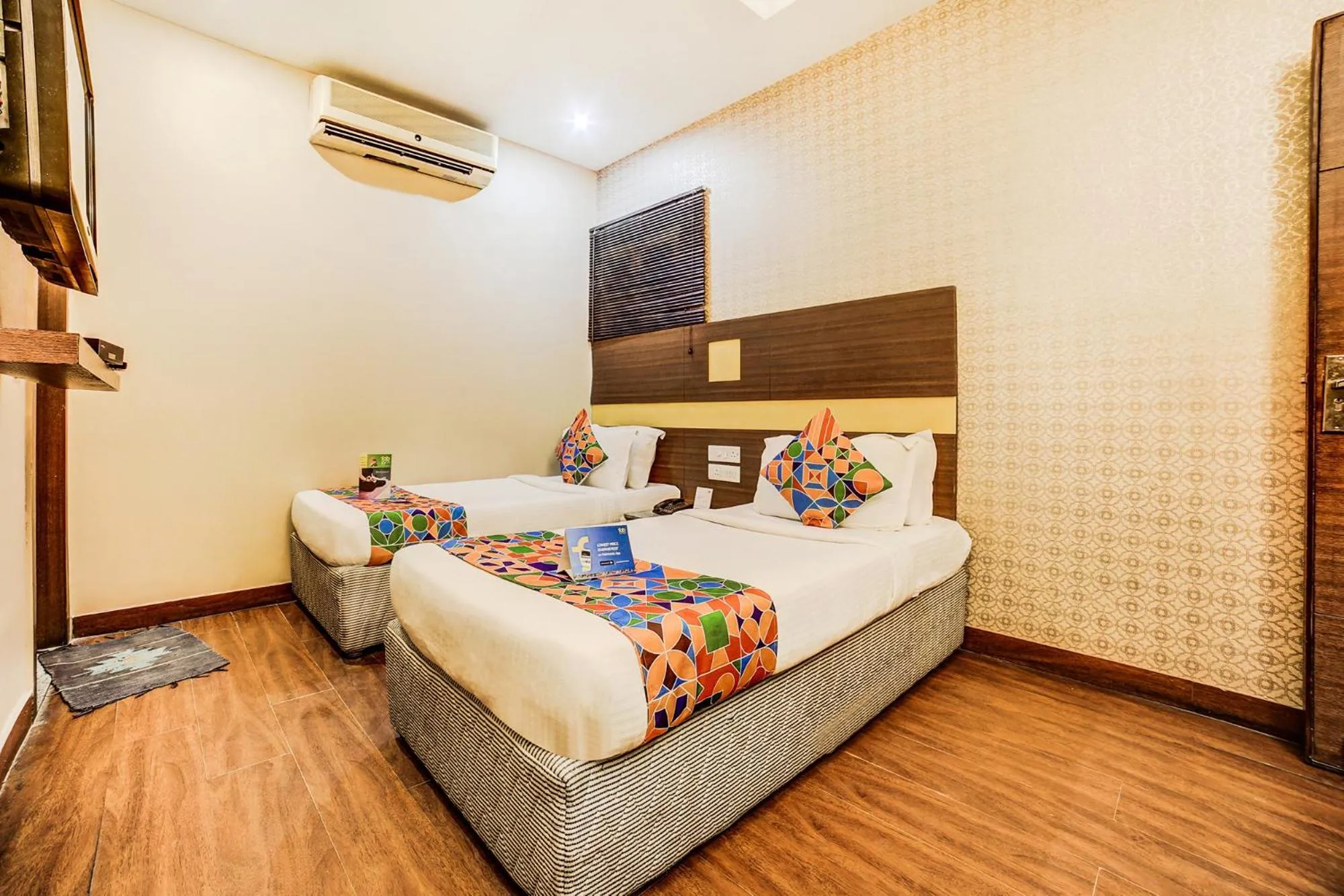 Bed in FabHotel Aqua