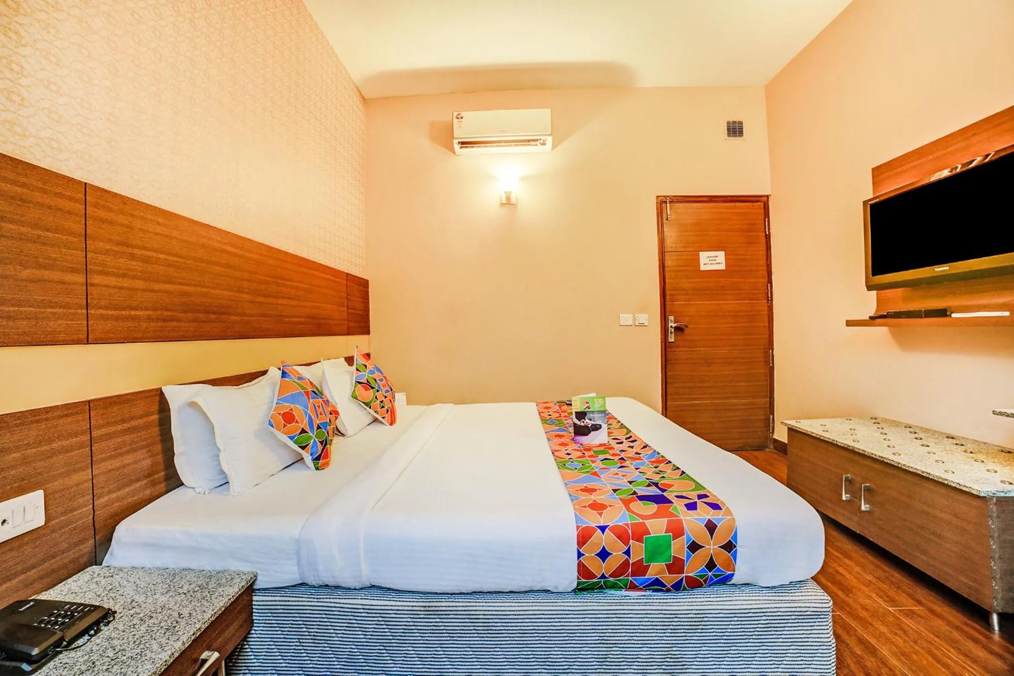 Bed in FabHotel Aqua