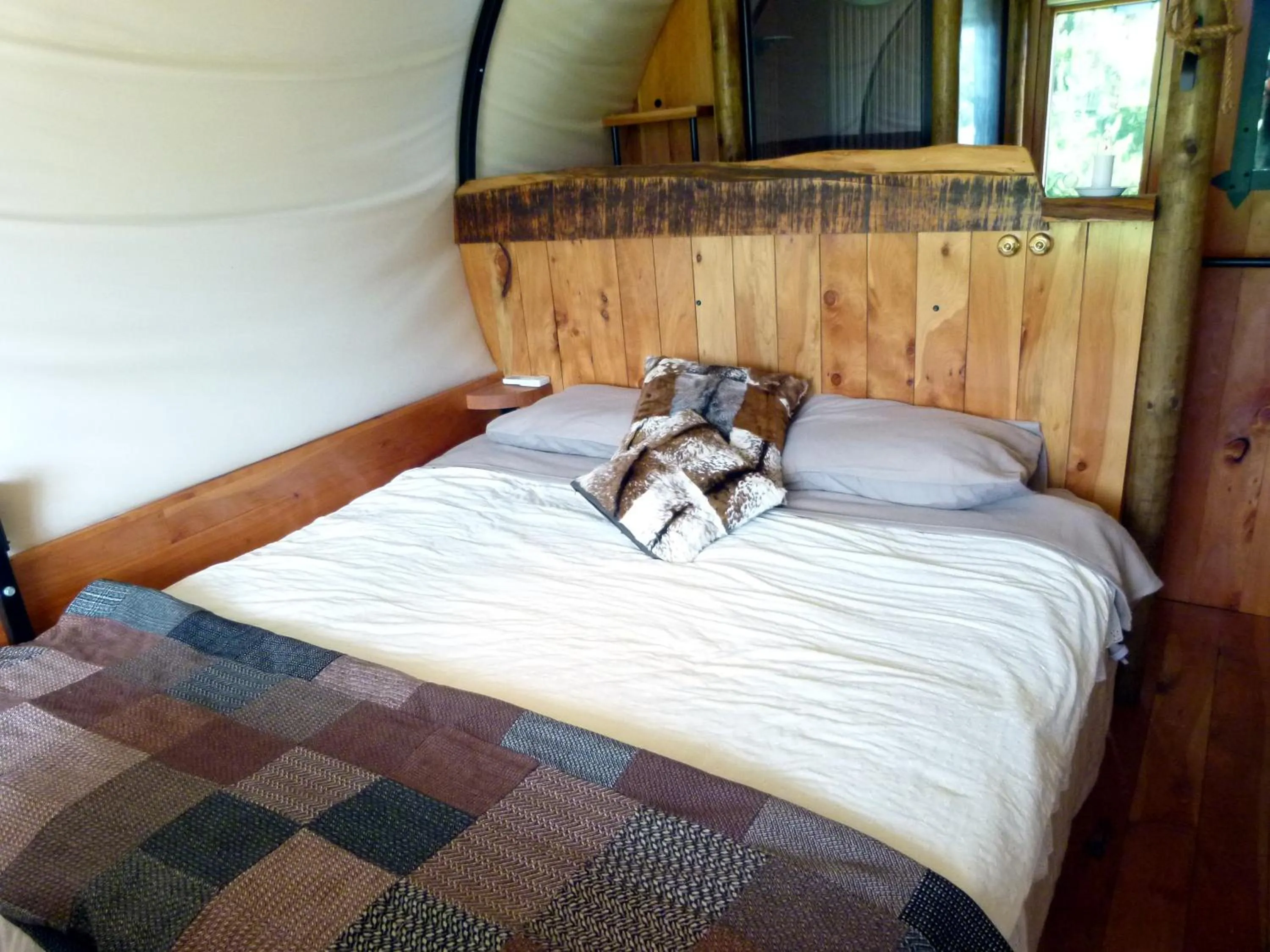 Bed in Wacky Stays - unique farm-stay glamping rentals, FREE animal feeding tours