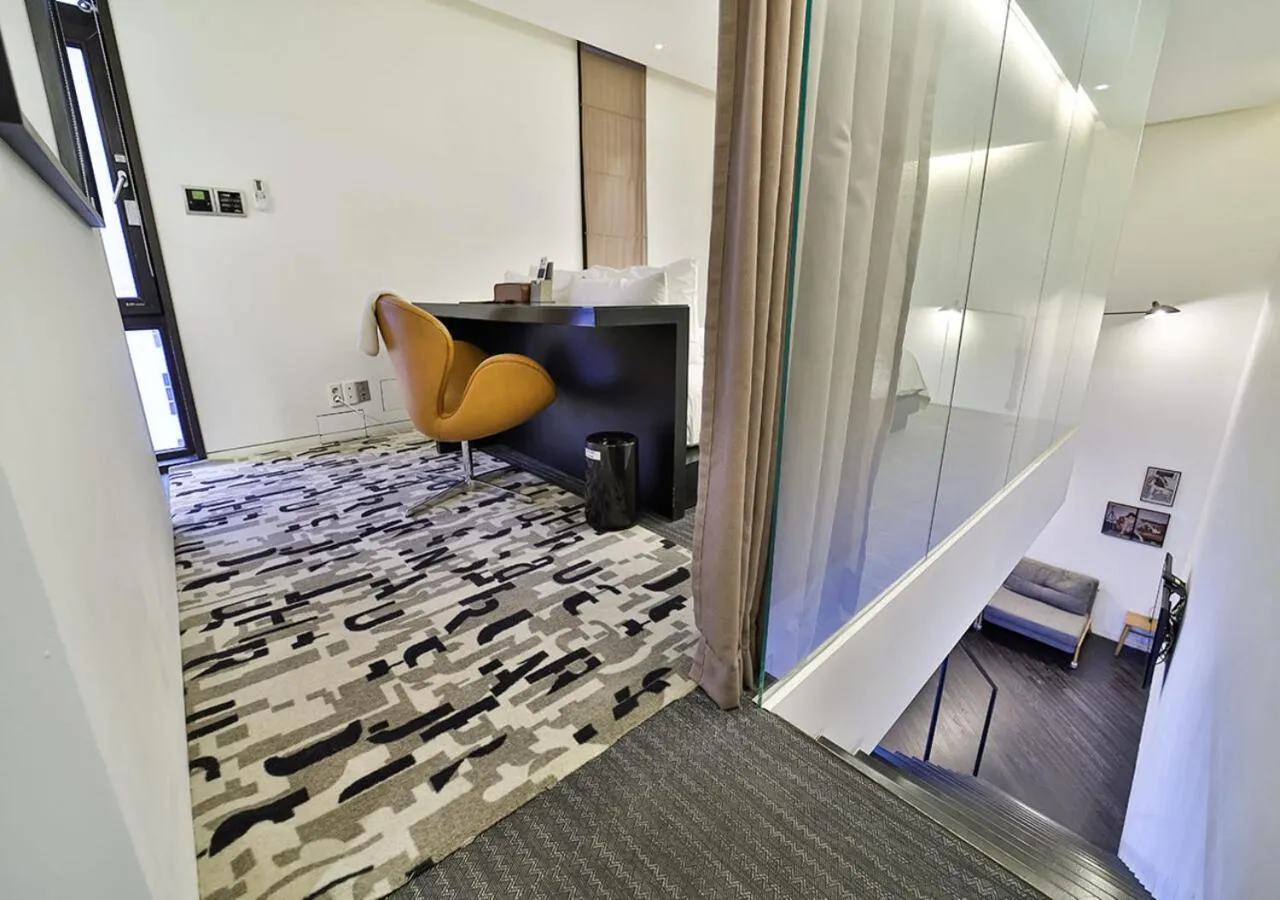 Bed in JS Boutique Hotel