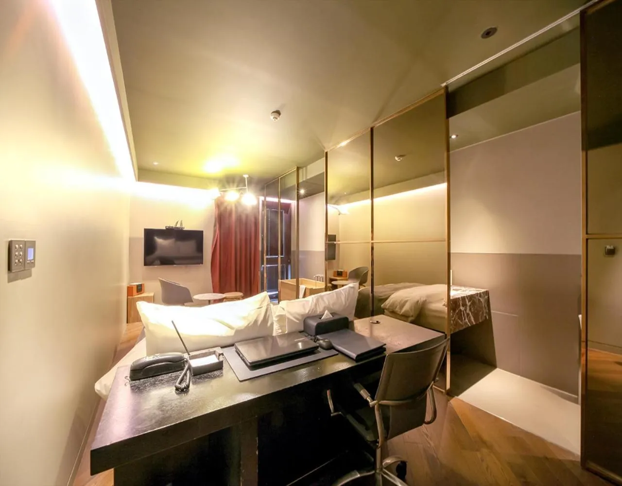 Bed in JS Boutique Hotel