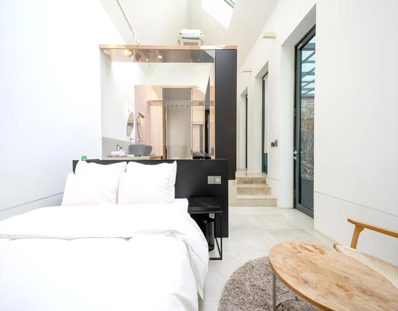 Bed in JS Boutique Hotel