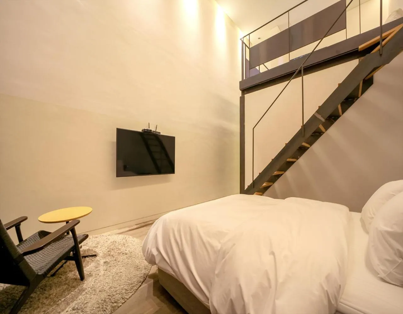 Bed in JS Boutique Hotel