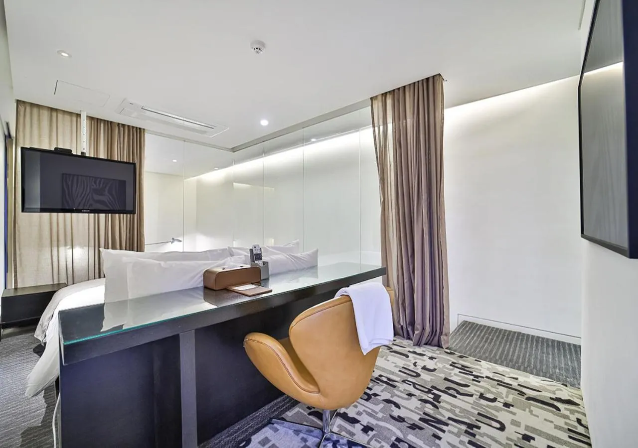 Bed in JS Boutique Hotel