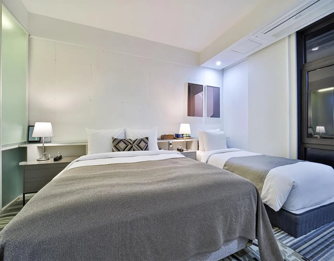 Bed in JS Boutique Hotel