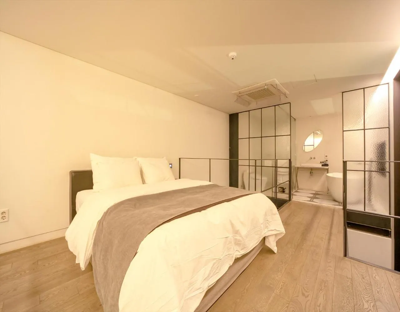 Bed in JS Boutique Hotel