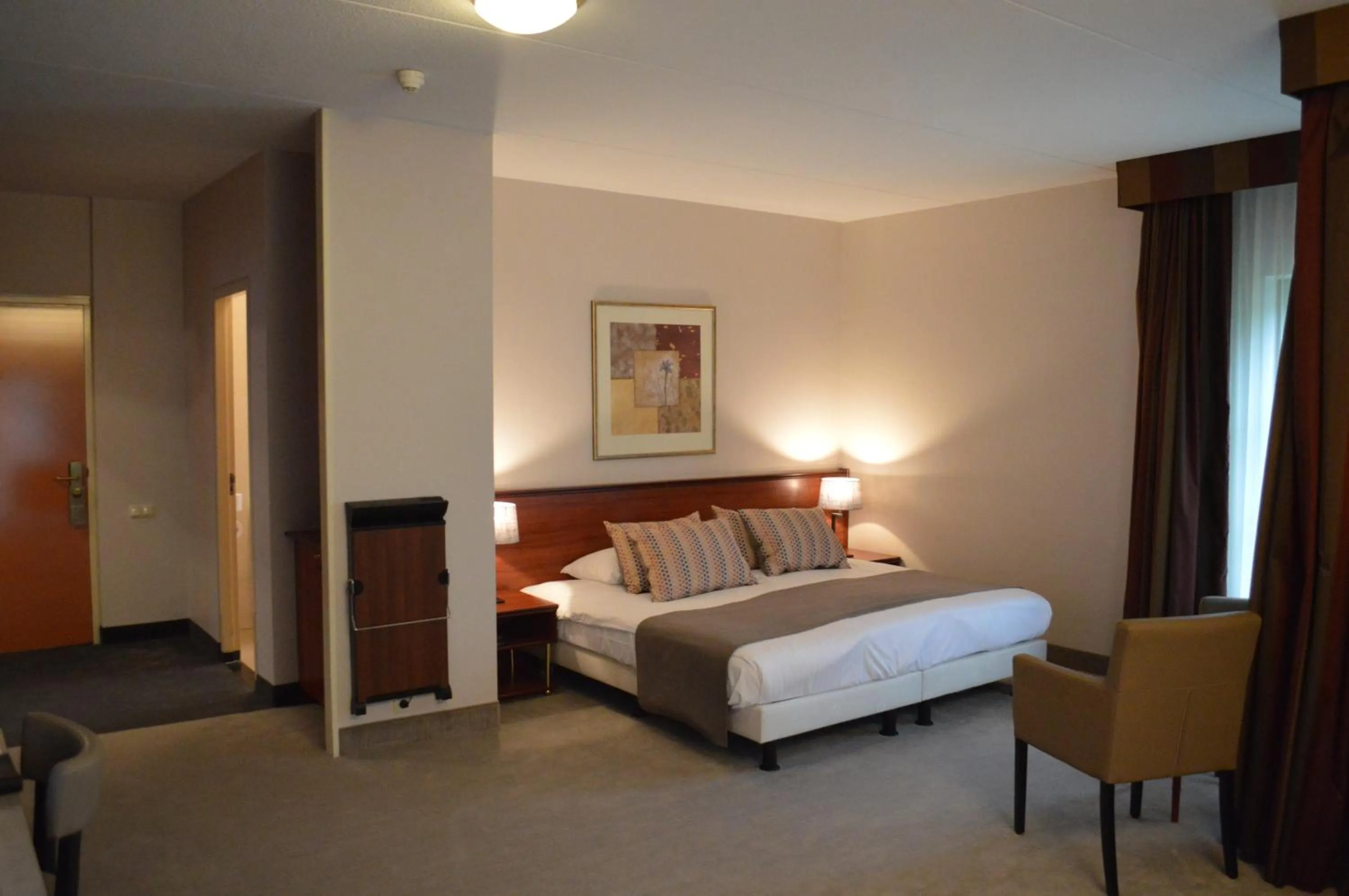 Bed in Parkhotel Tjaarda