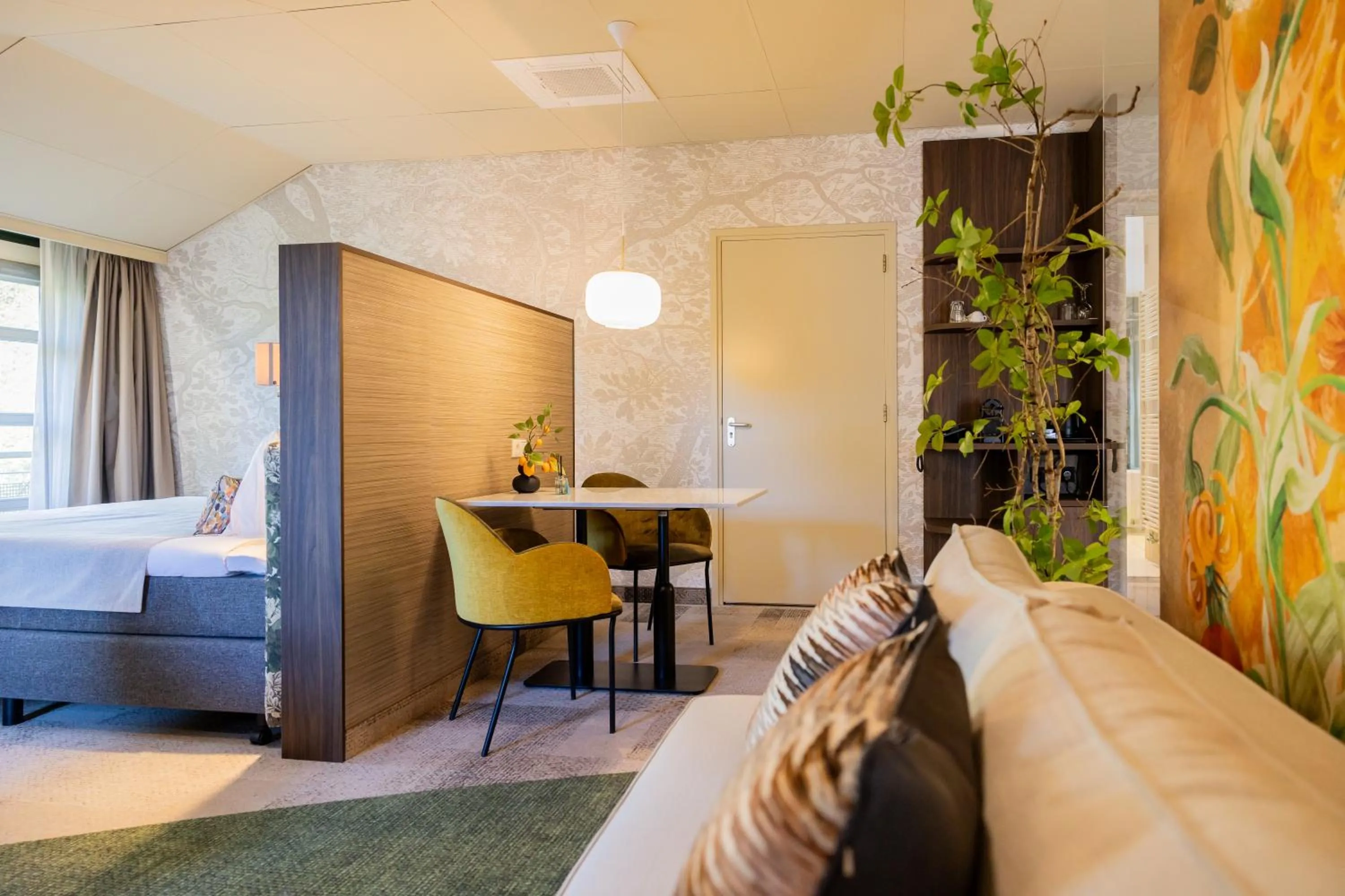 Seating area, Bed in Parkhotel Tjaarda