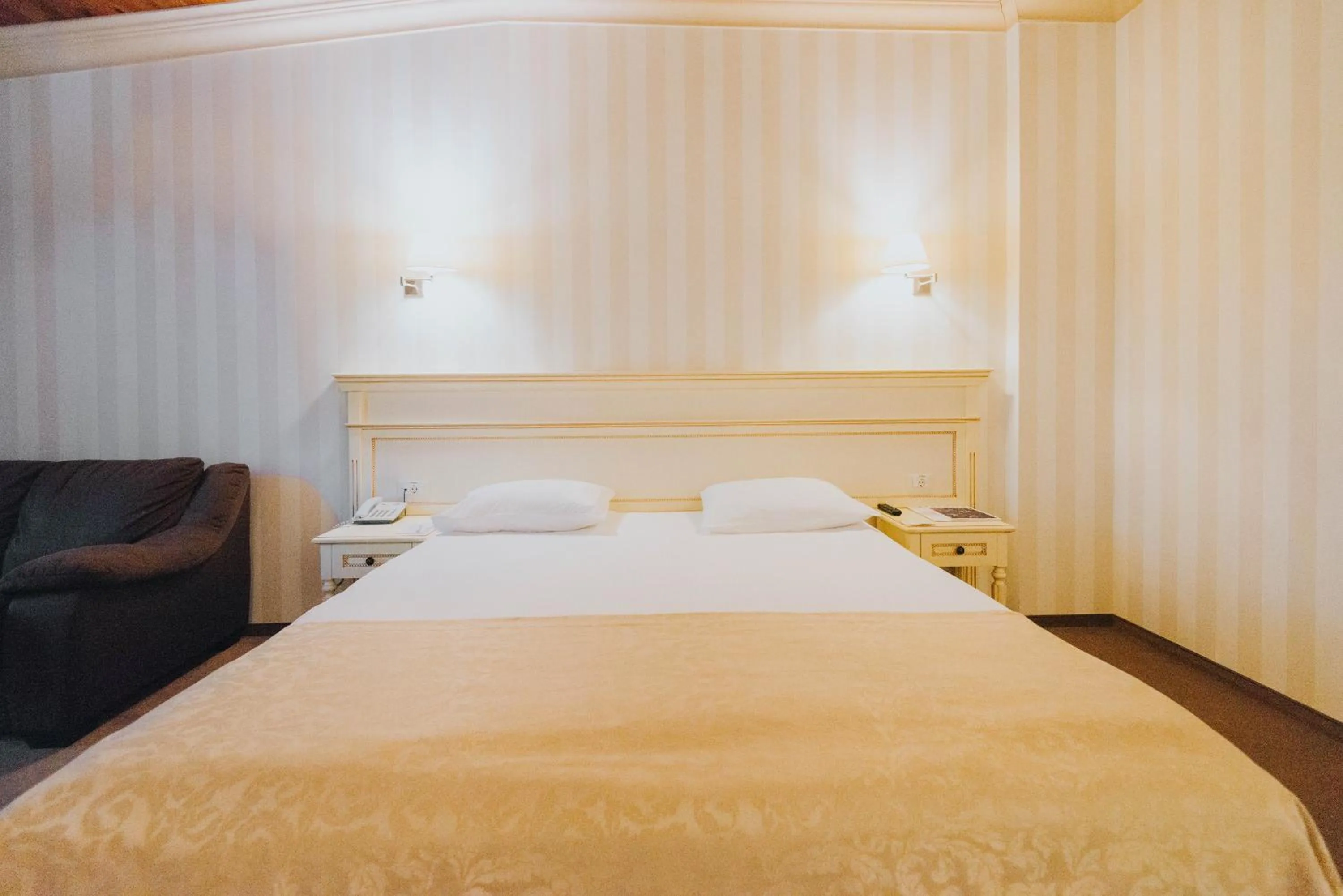 Bed in Premier Geneva Hotel