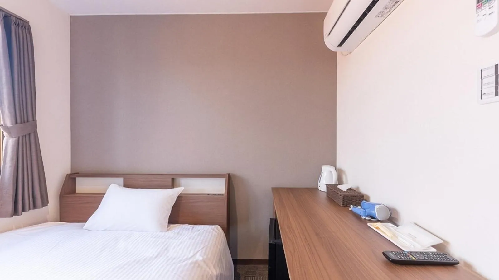 Bed in FLY CAT HOTEL