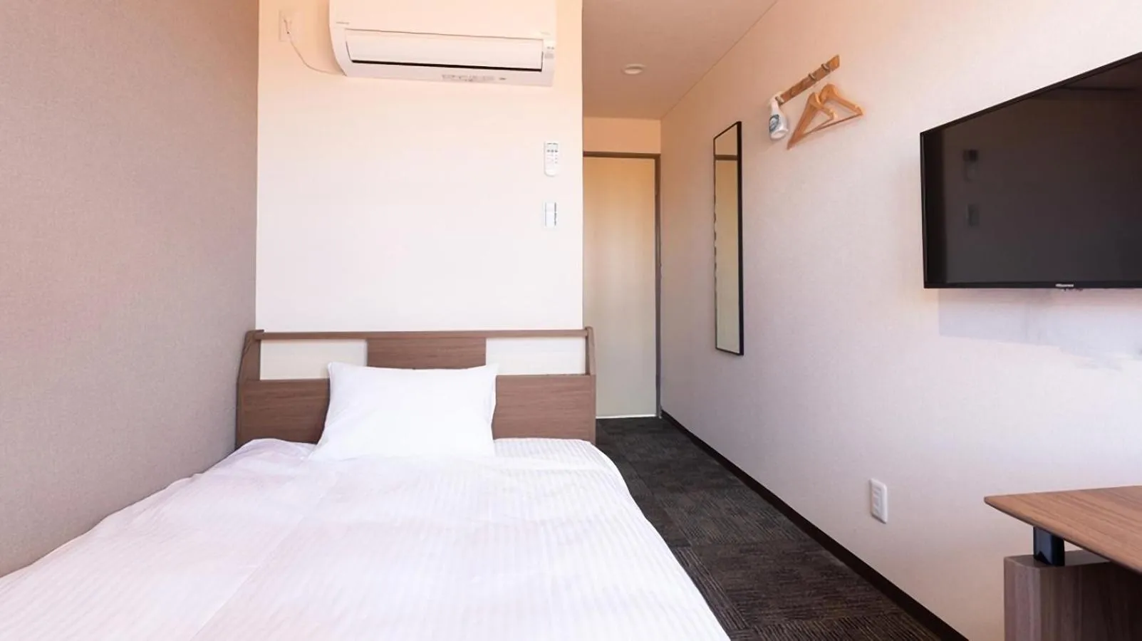 Bed in FLY CAT HOTEL