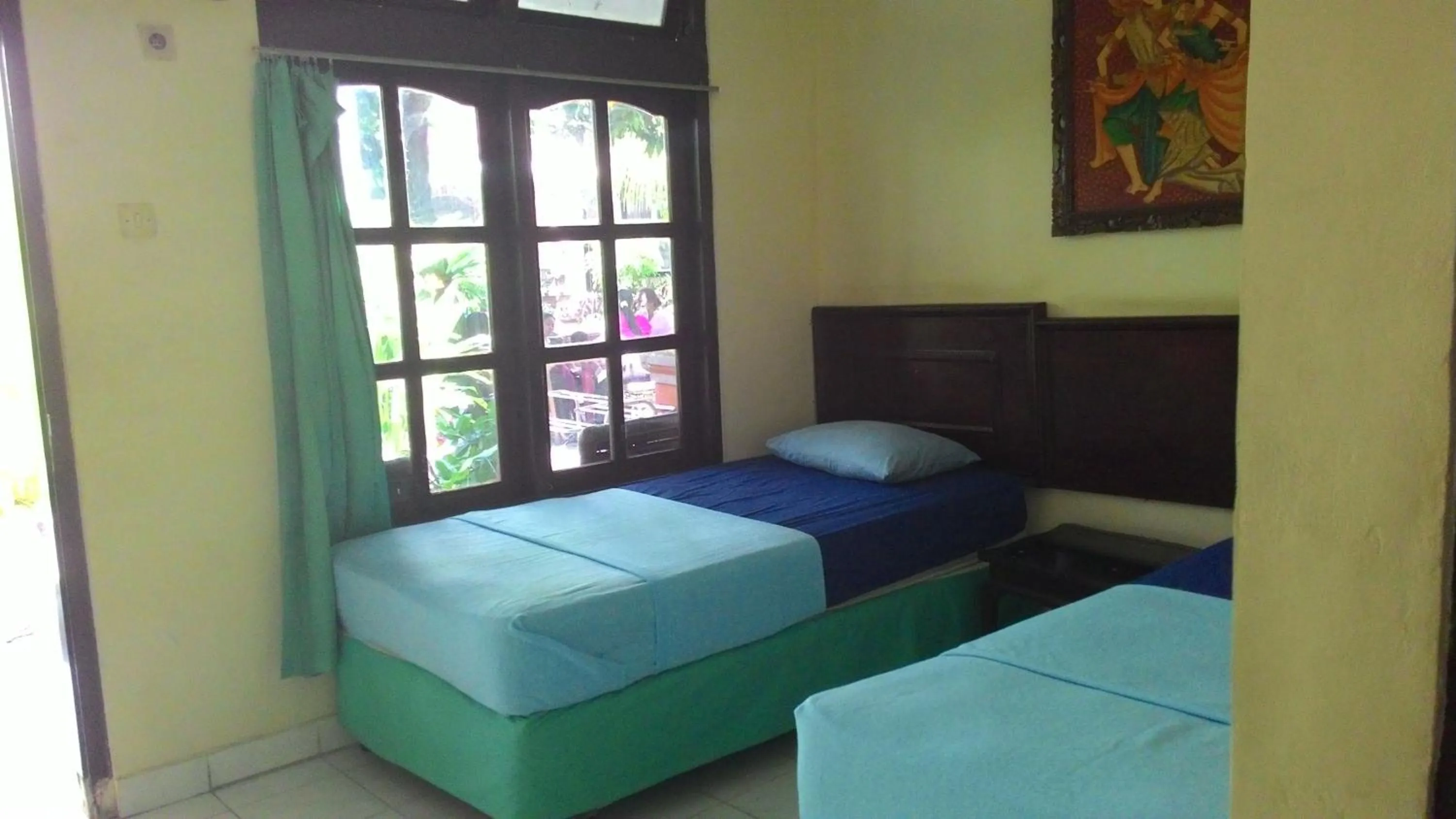 Photo of the whole room, Bed in Mahendra Beach Inn