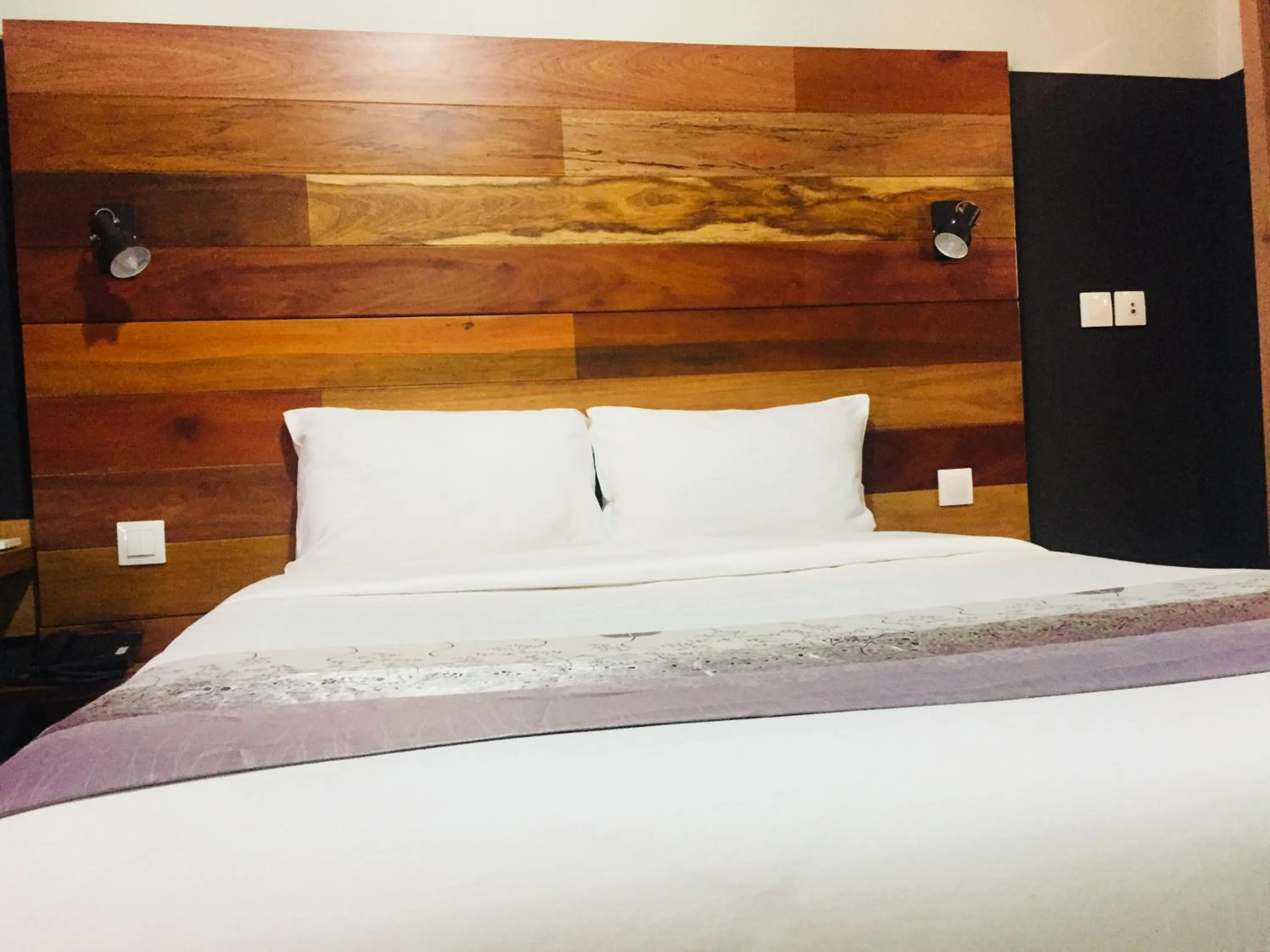 Bed in Détente Hôtel