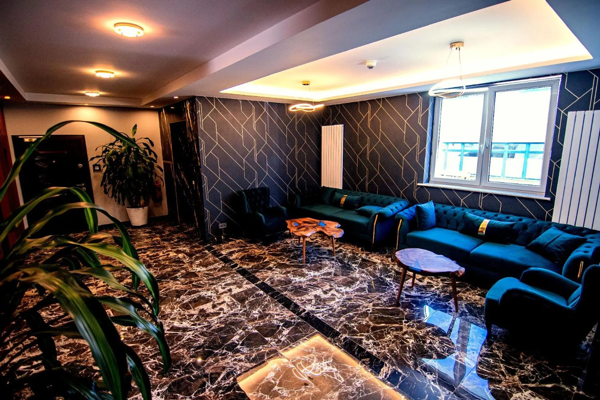 Communal lounge/ TV room in Hotel Yaman