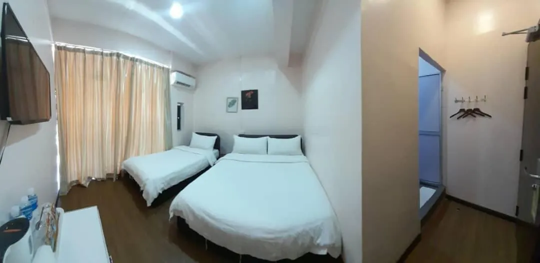 Bed in Sipadan Crystal Haven Inn