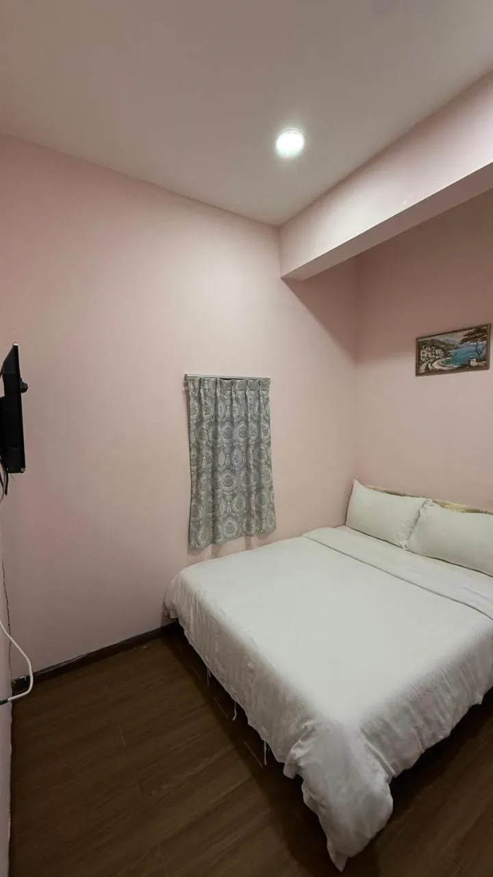 Bed in Sipadan Crystal Haven Inn