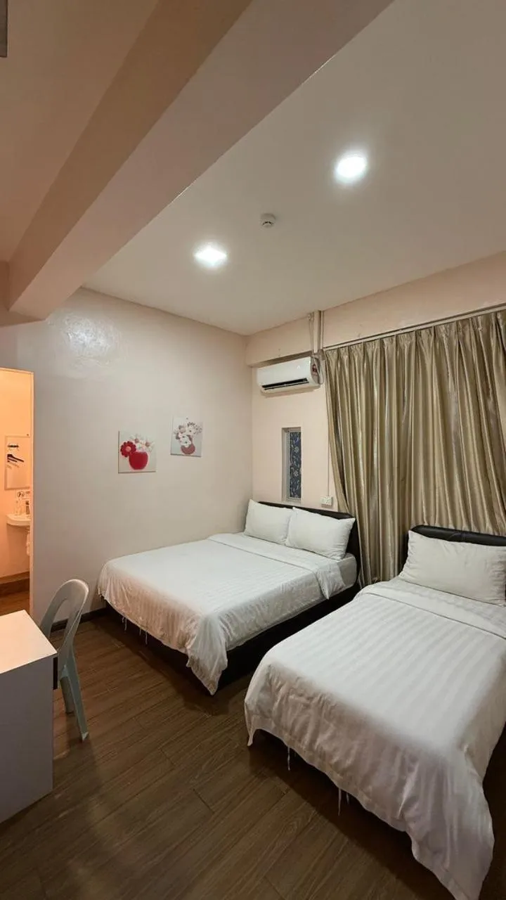 Bed in Sipadan Crystal Haven Inn