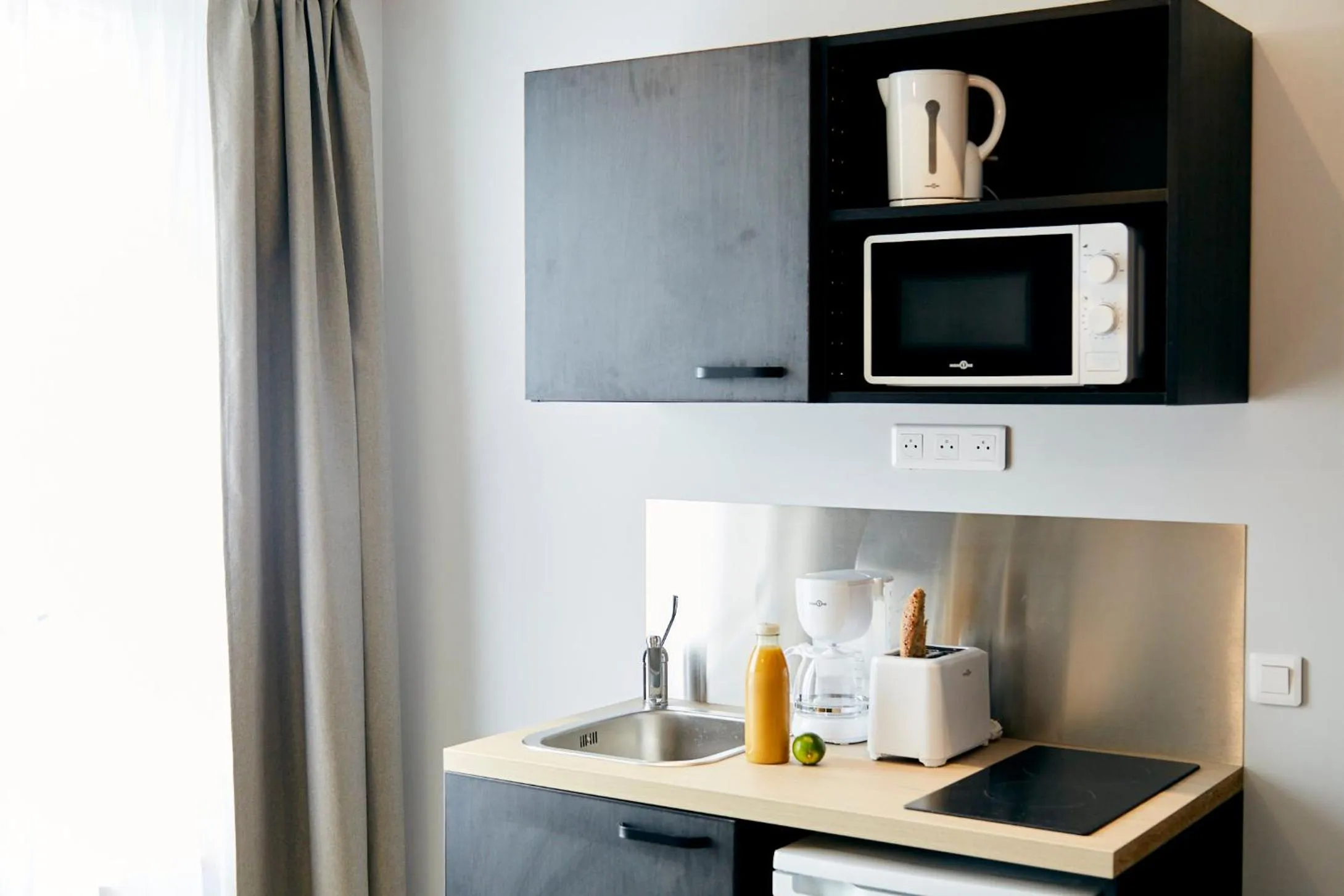 Kitchen or kitchenette in Smart Appart Le Havre 97