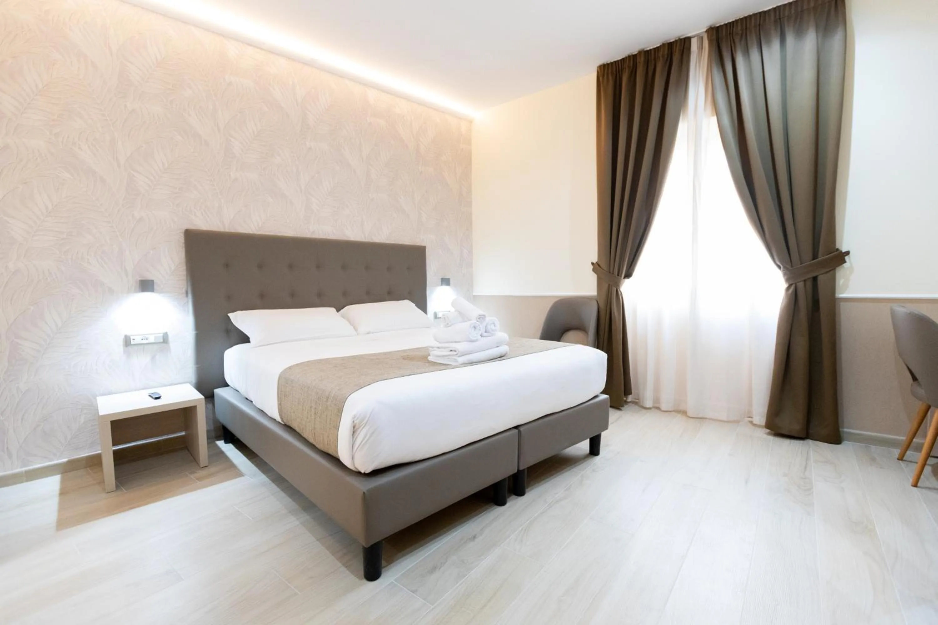 Bed in Hotel Maximus