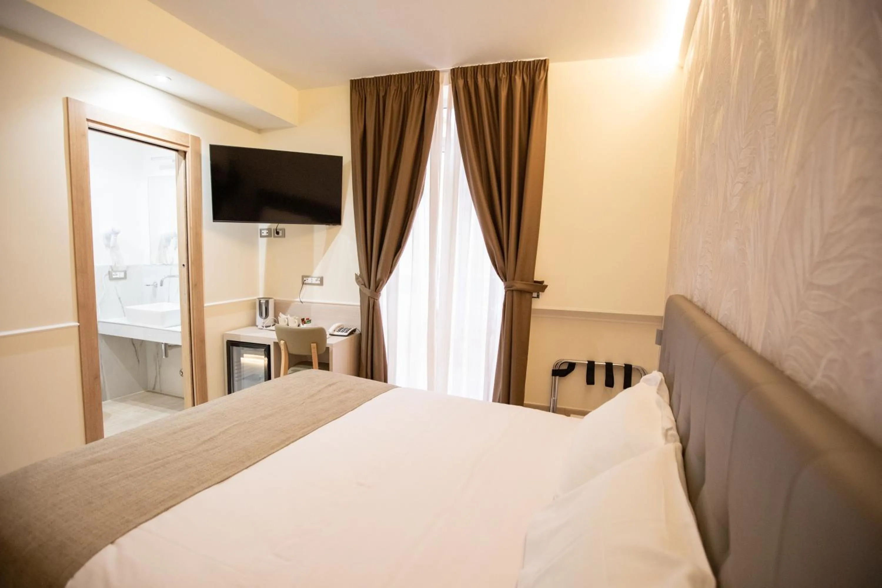 Bed in Hotel Maximus