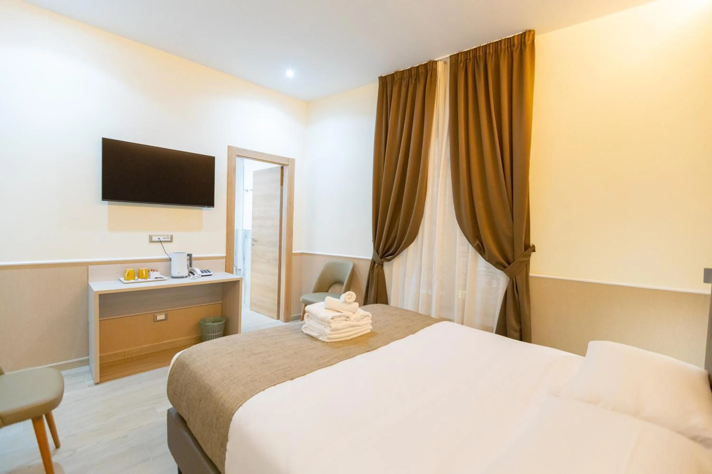 Bed in Hotel Maximus