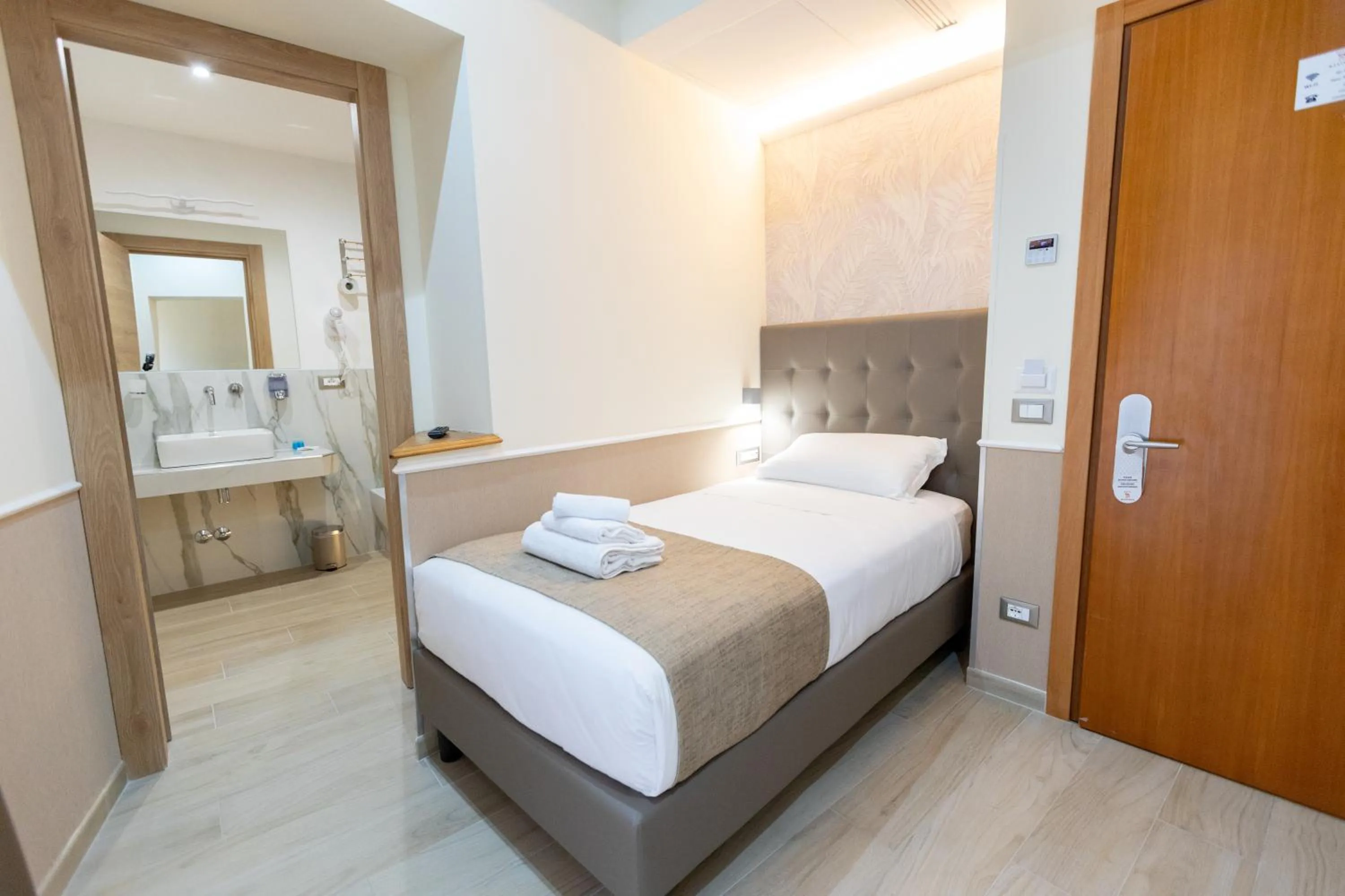 Bed in Hotel Maximus