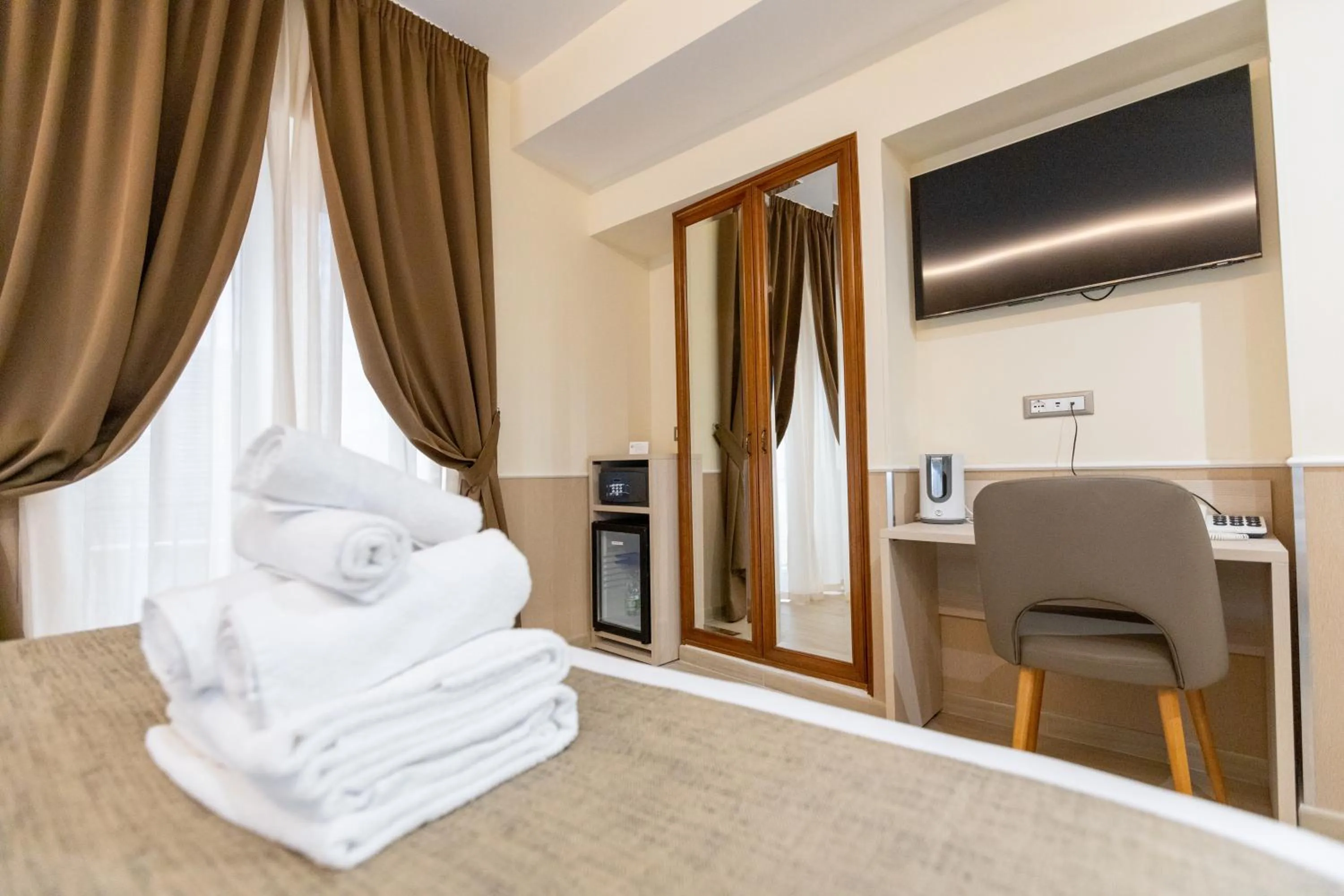 Bed in Hotel Maximus