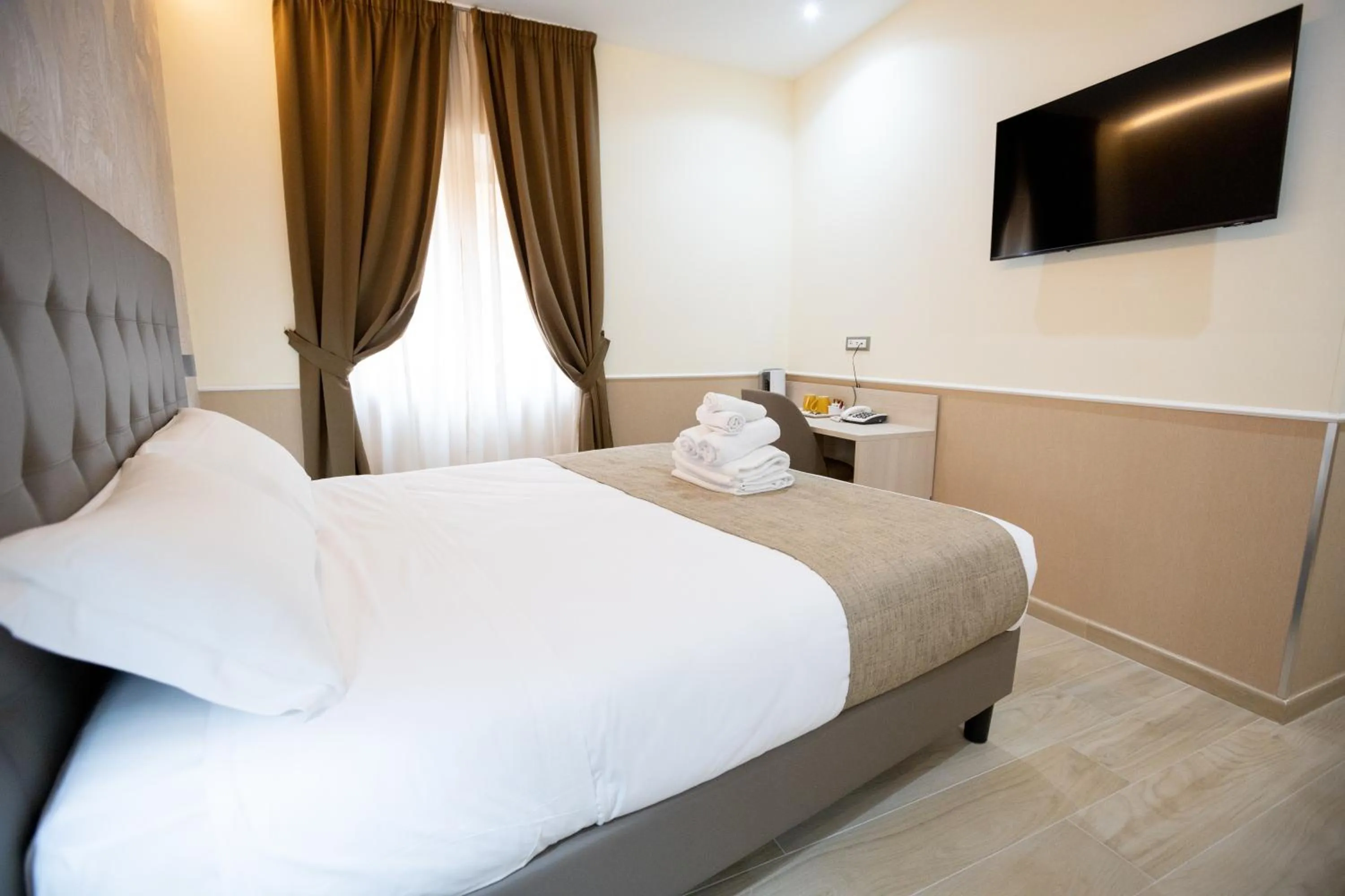 Bed in Hotel Maximus