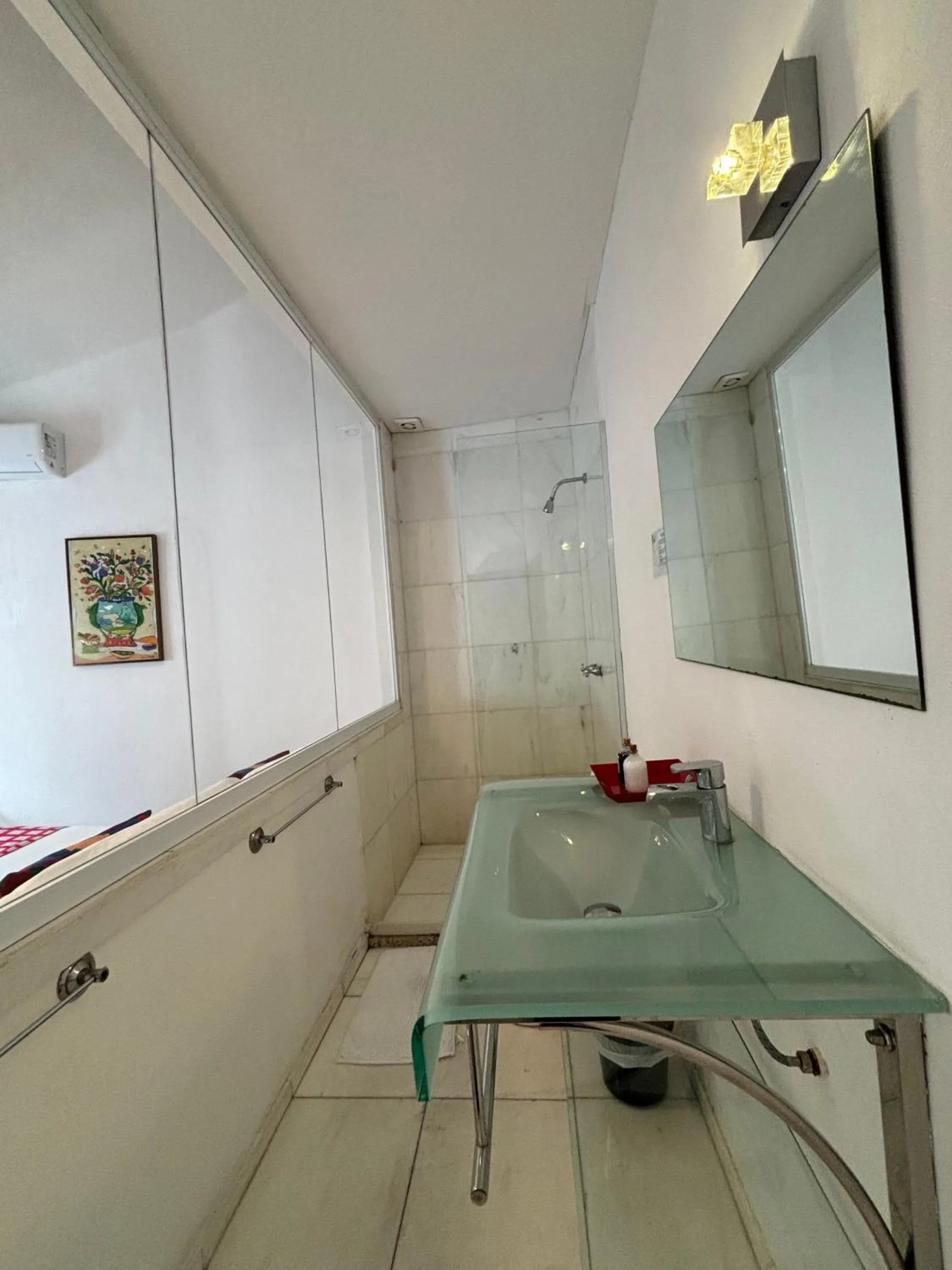 Bathroom in Les Jardins de Rio Boutique Hotel