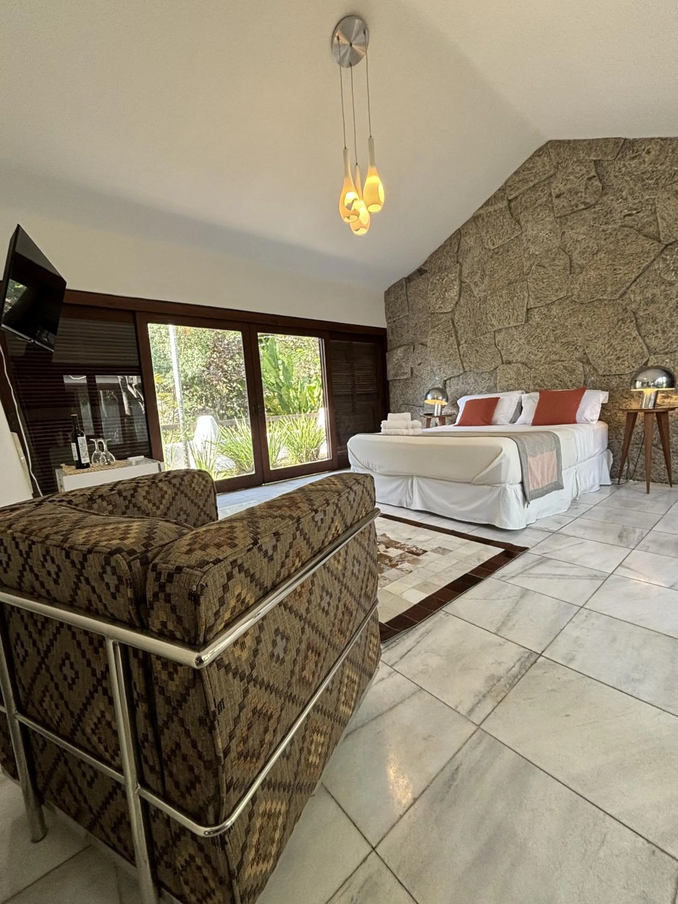 Bed in Les Jardins de Rio Boutique Hotel