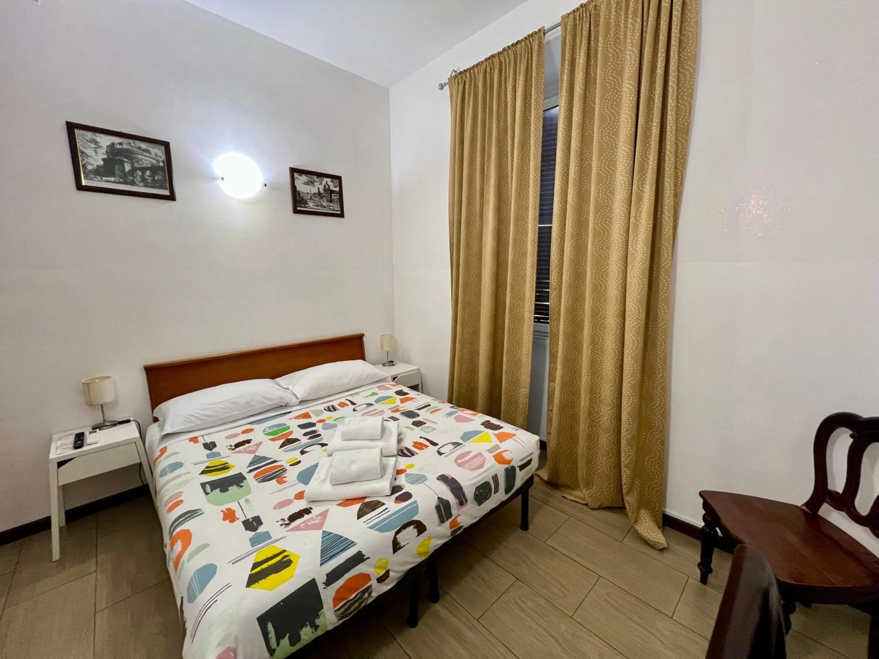 Photo of the whole room, Bed in Booking Inn Settembre 95