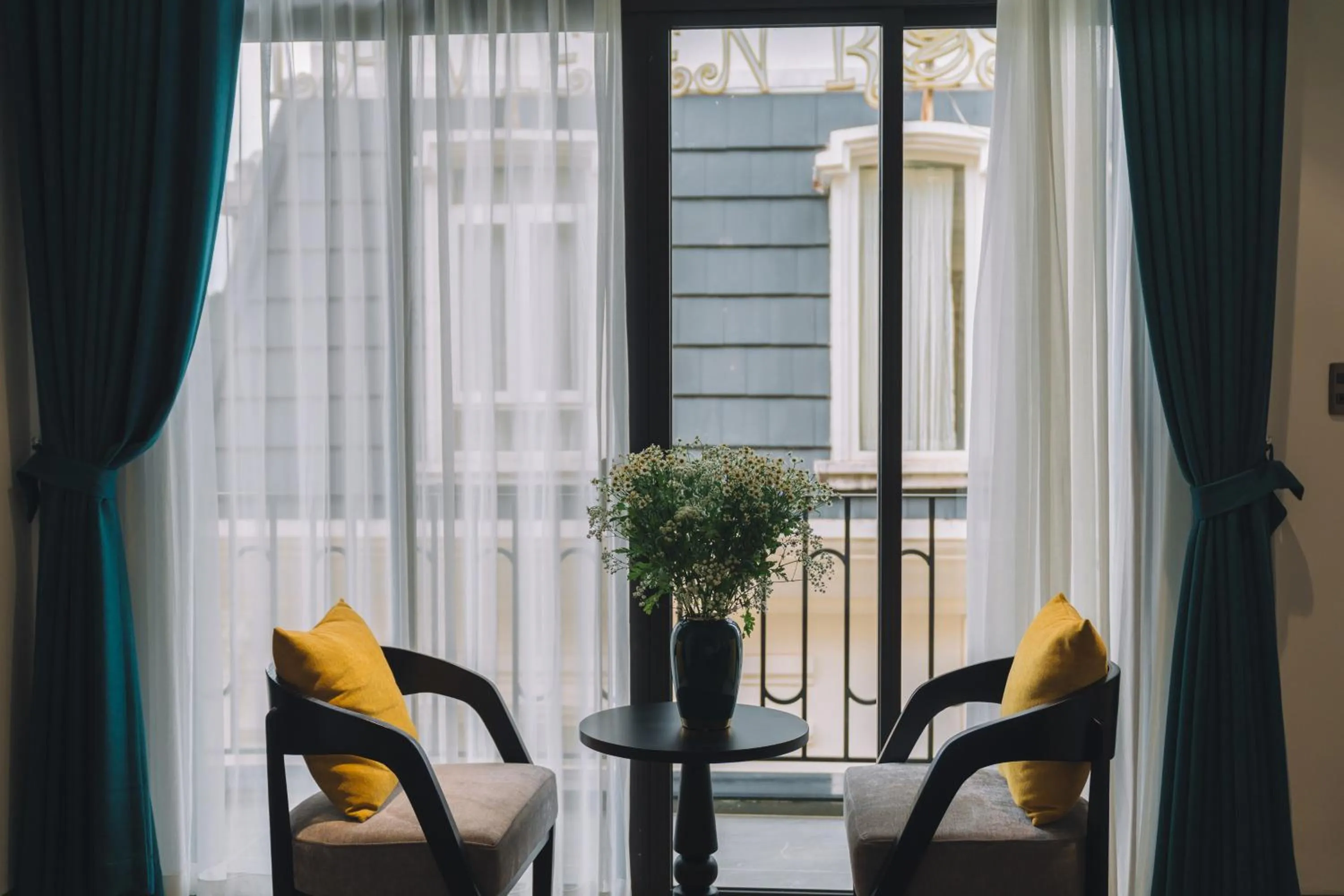 Seating area in Goldient Boutique Hotel