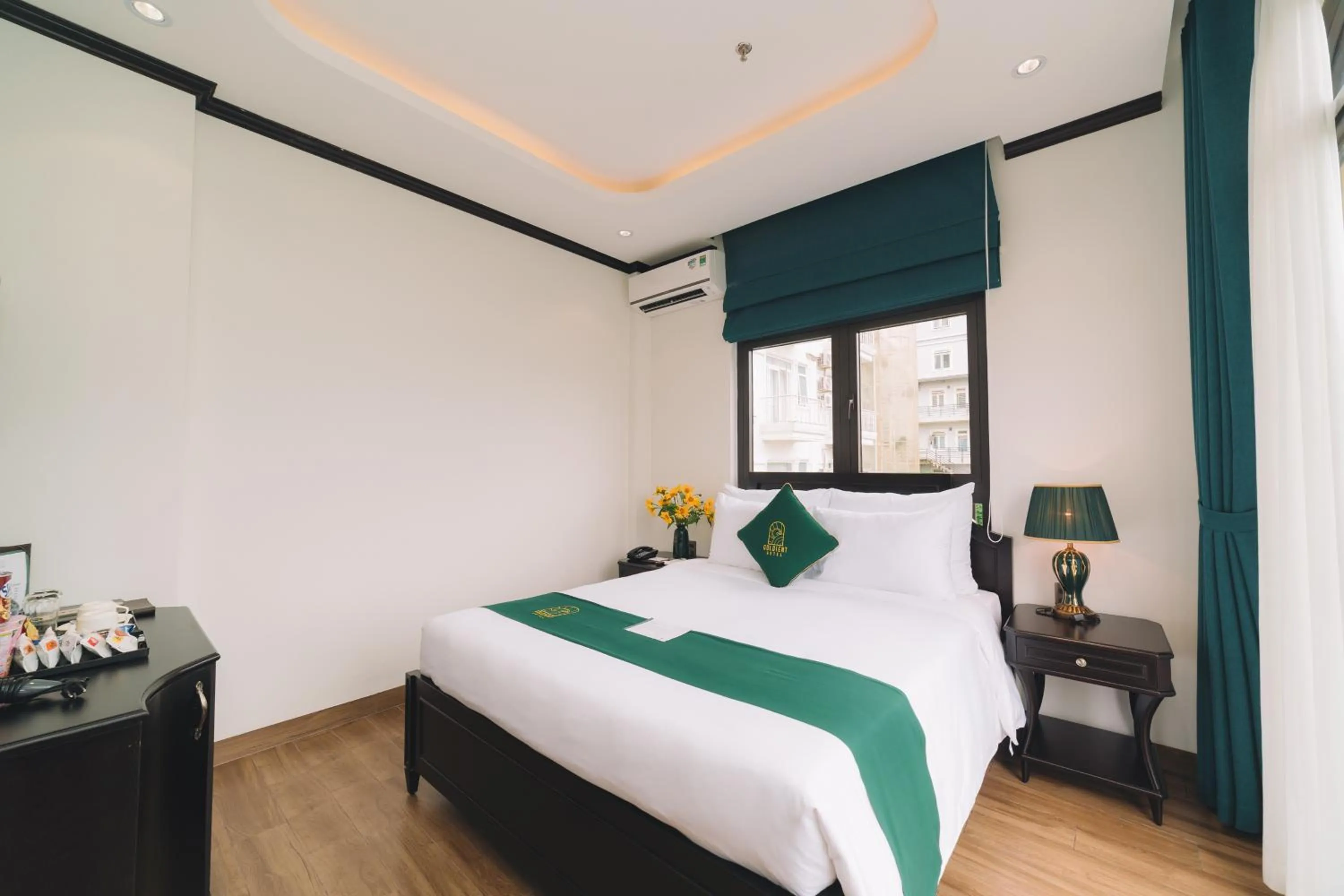 Bed in Goldient Boutique Hotel