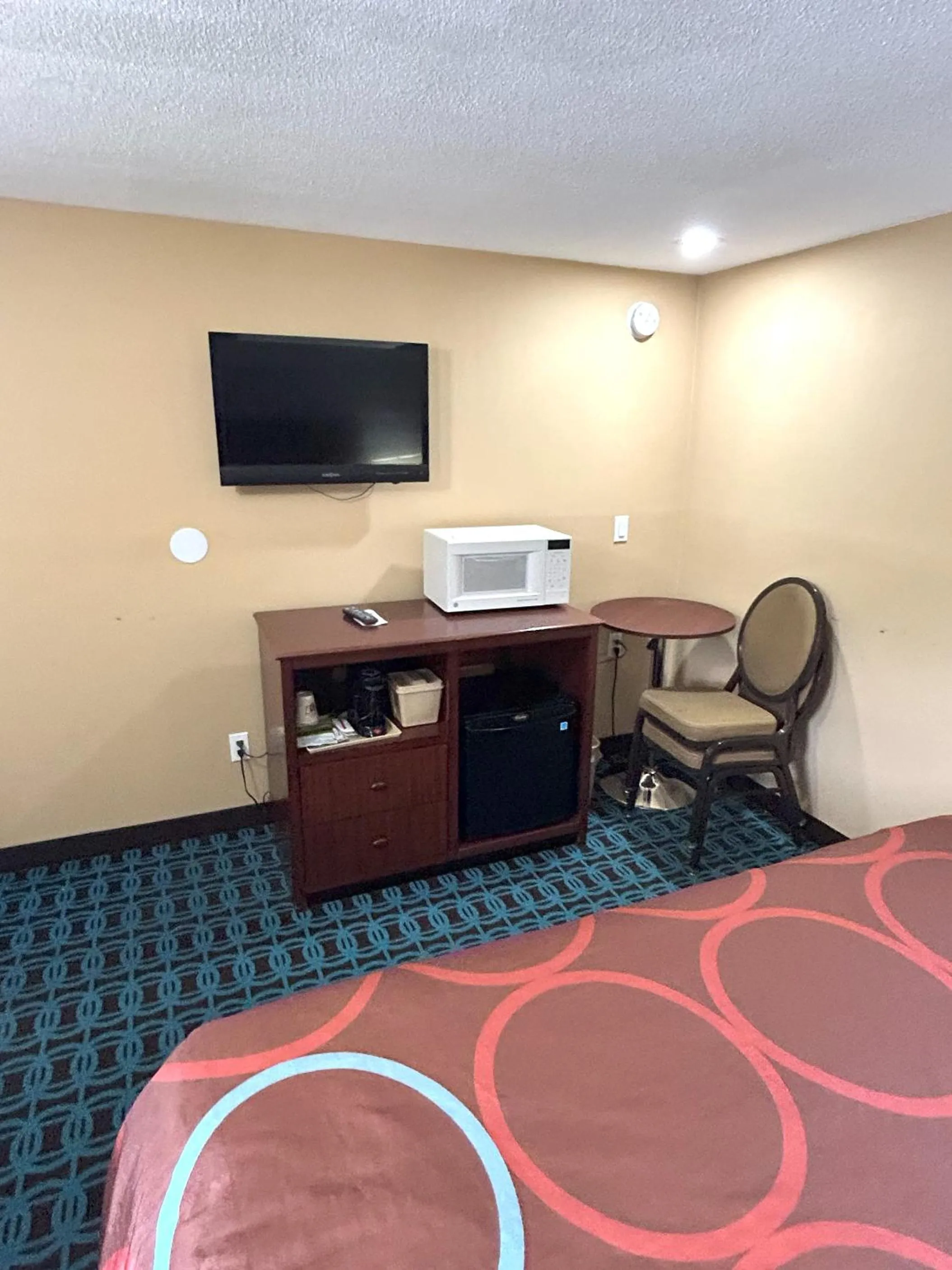 Bedroom in The Villager Motel