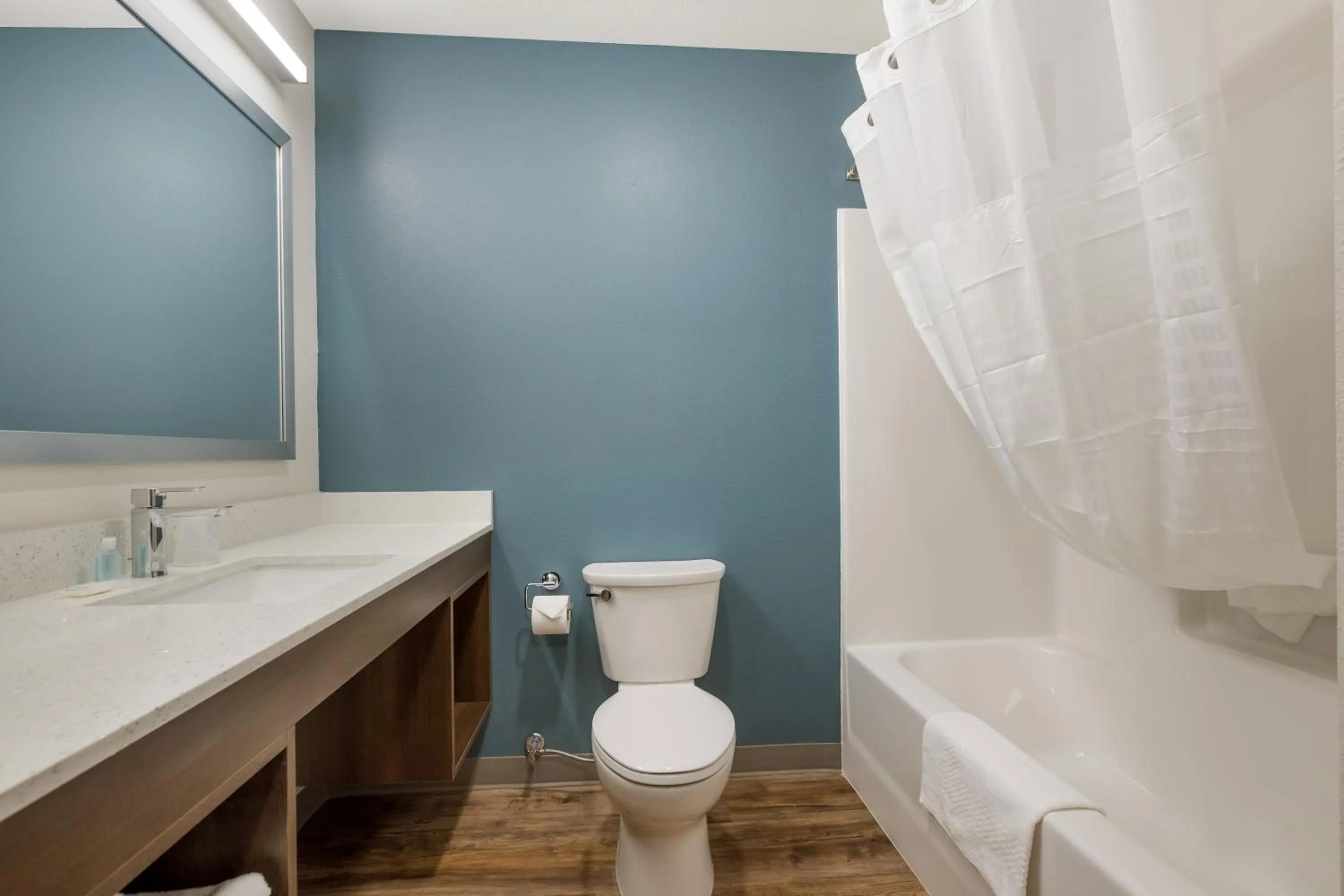 Bathroom in WoodSpring Suites Corona