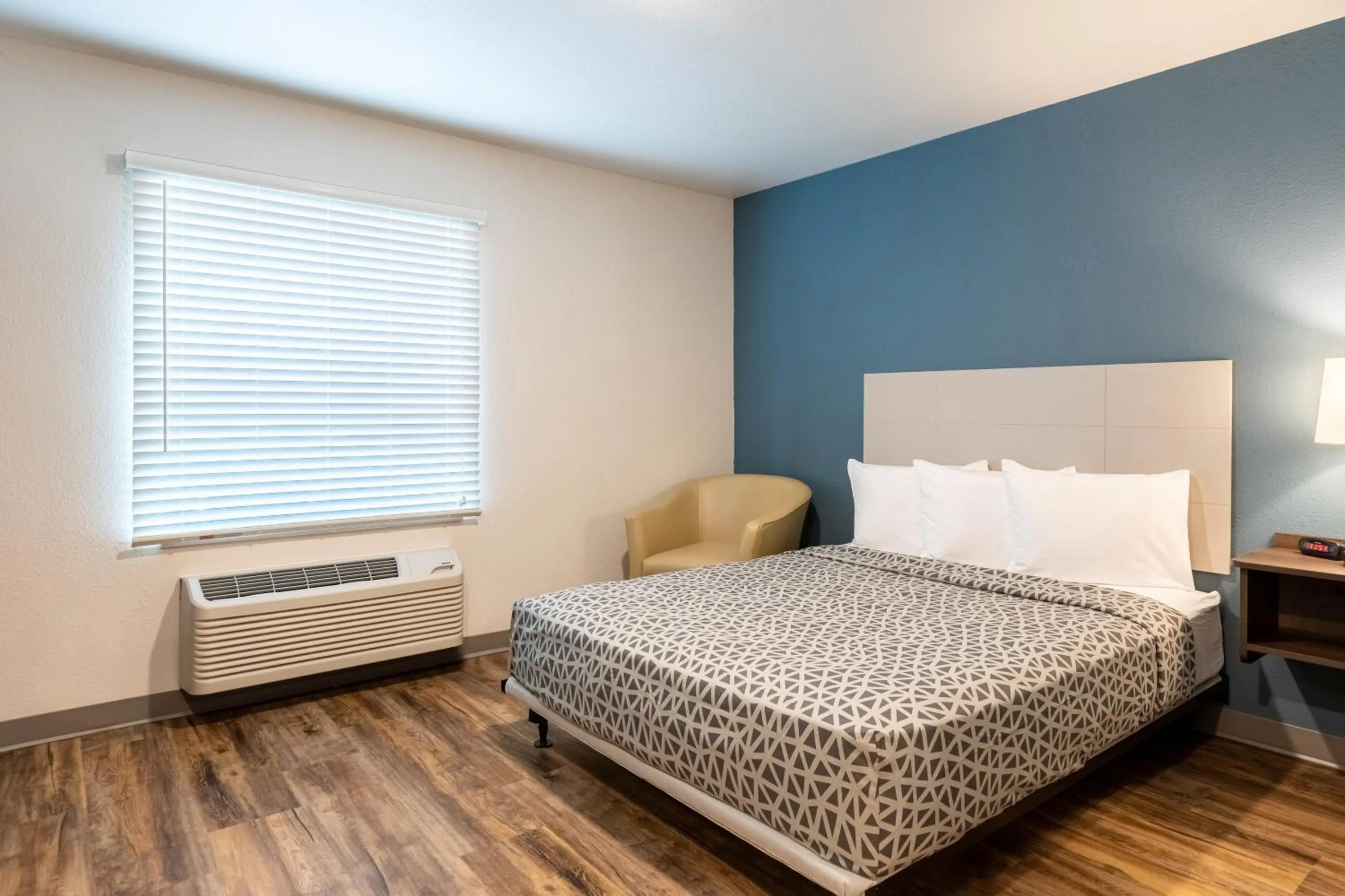 Bedroom, Bed in WoodSpring Suites Corona