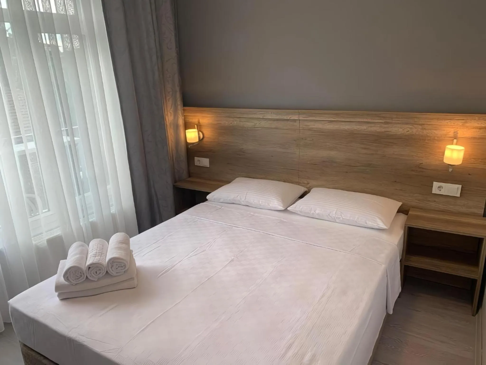 Communal lounge/ TV room, Bed in Rinascente