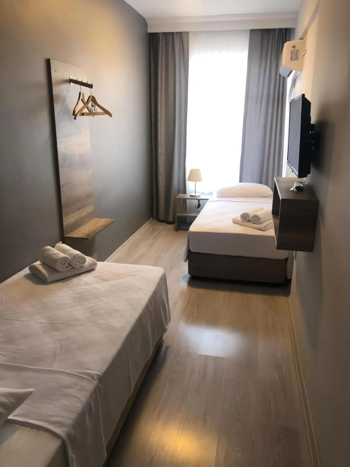 Communal lounge/ TV room, Bed in Rinascente