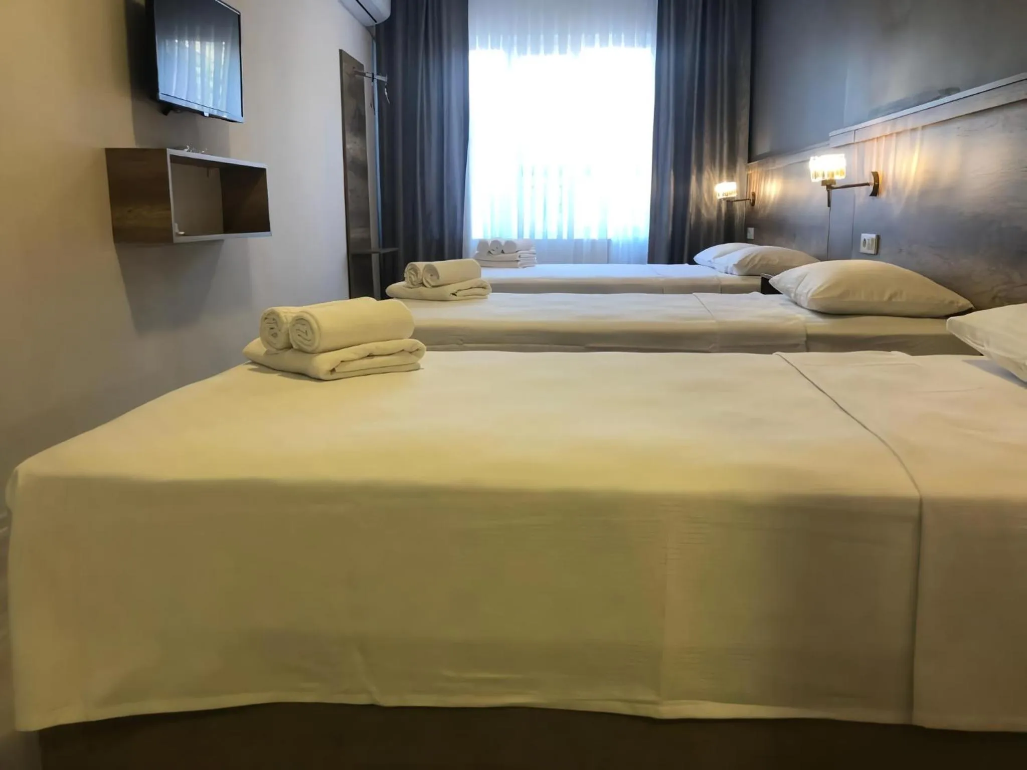 Communal lounge/ TV room, Bed in Rinascente