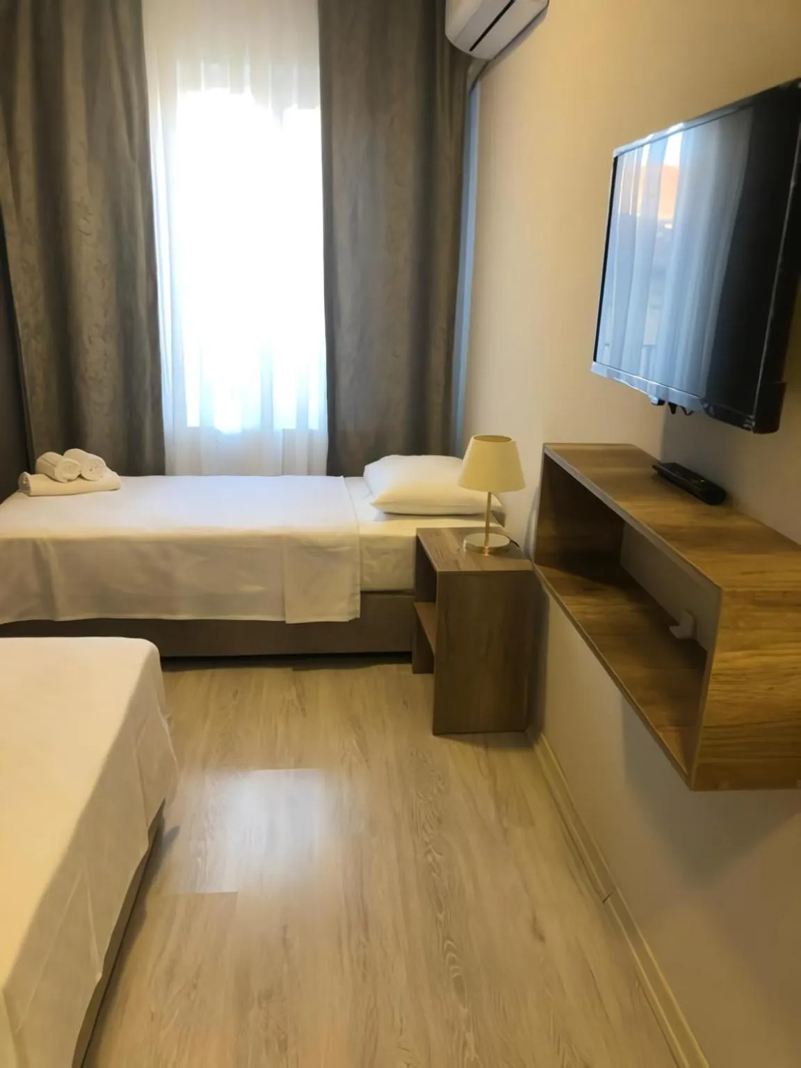 Communal lounge/ TV room, Bed in Rinascente