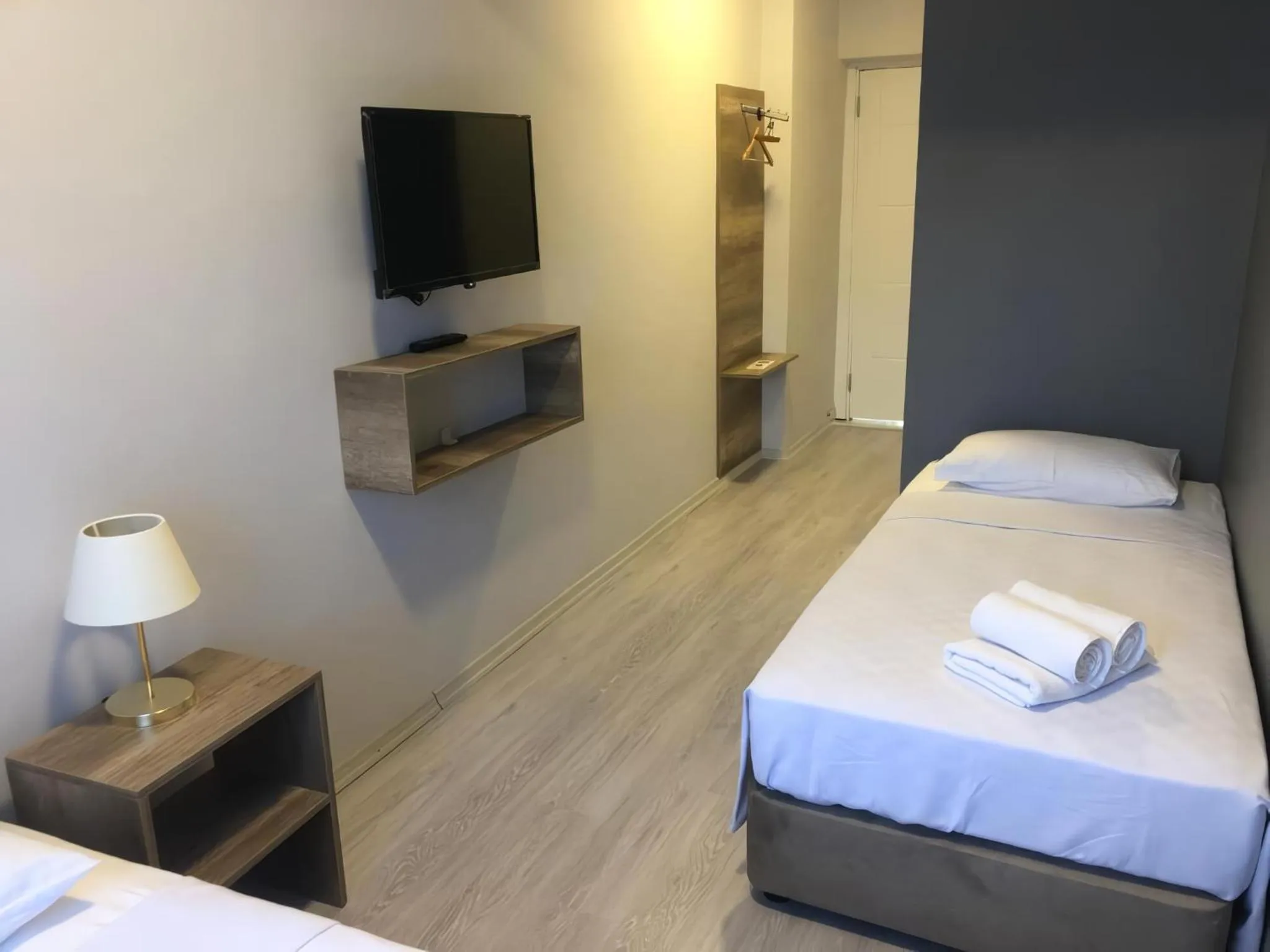 Communal lounge/ TV room, Bed in Rinascente