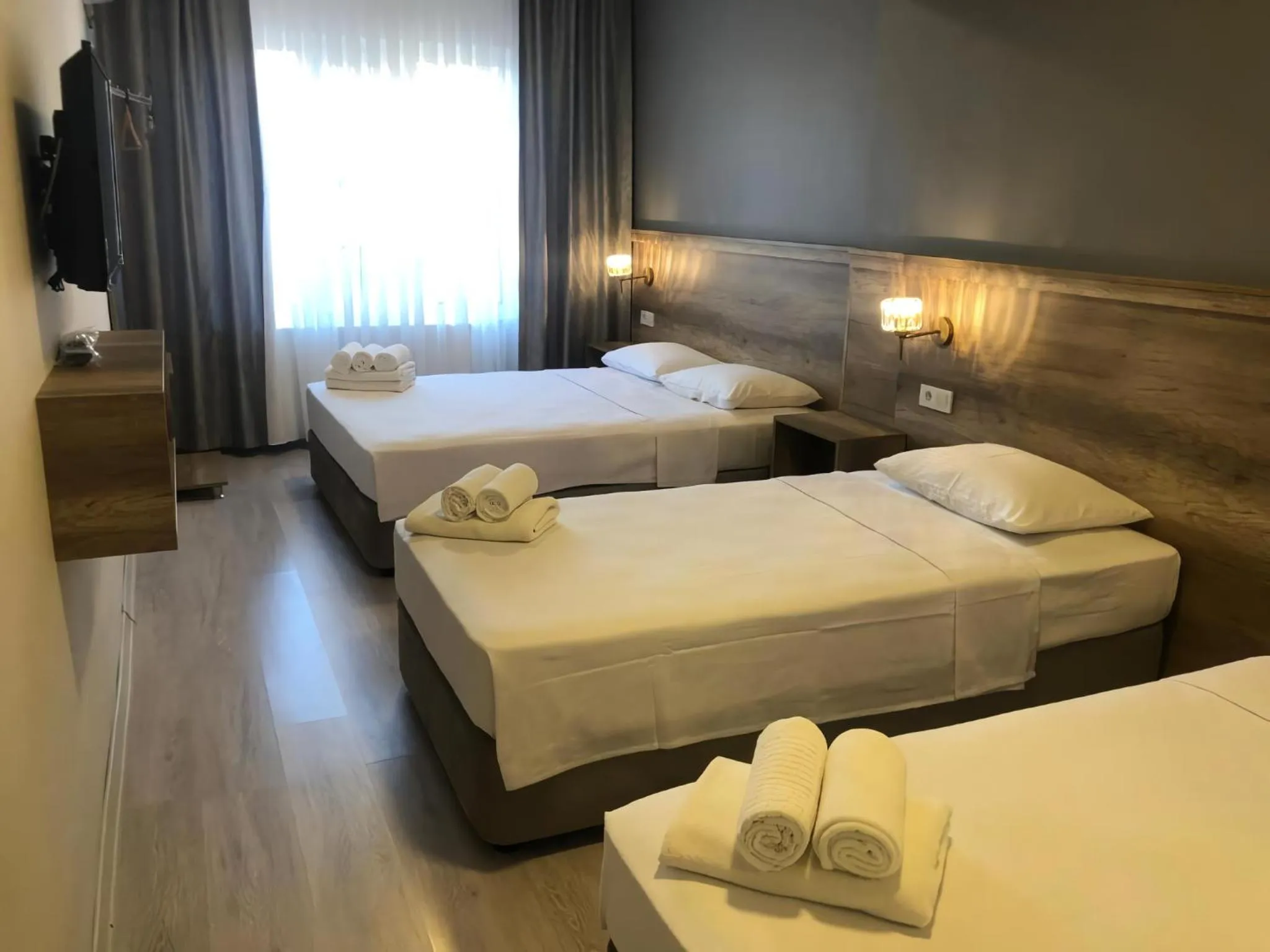 Communal lounge/ TV room, Bed in Rinascente