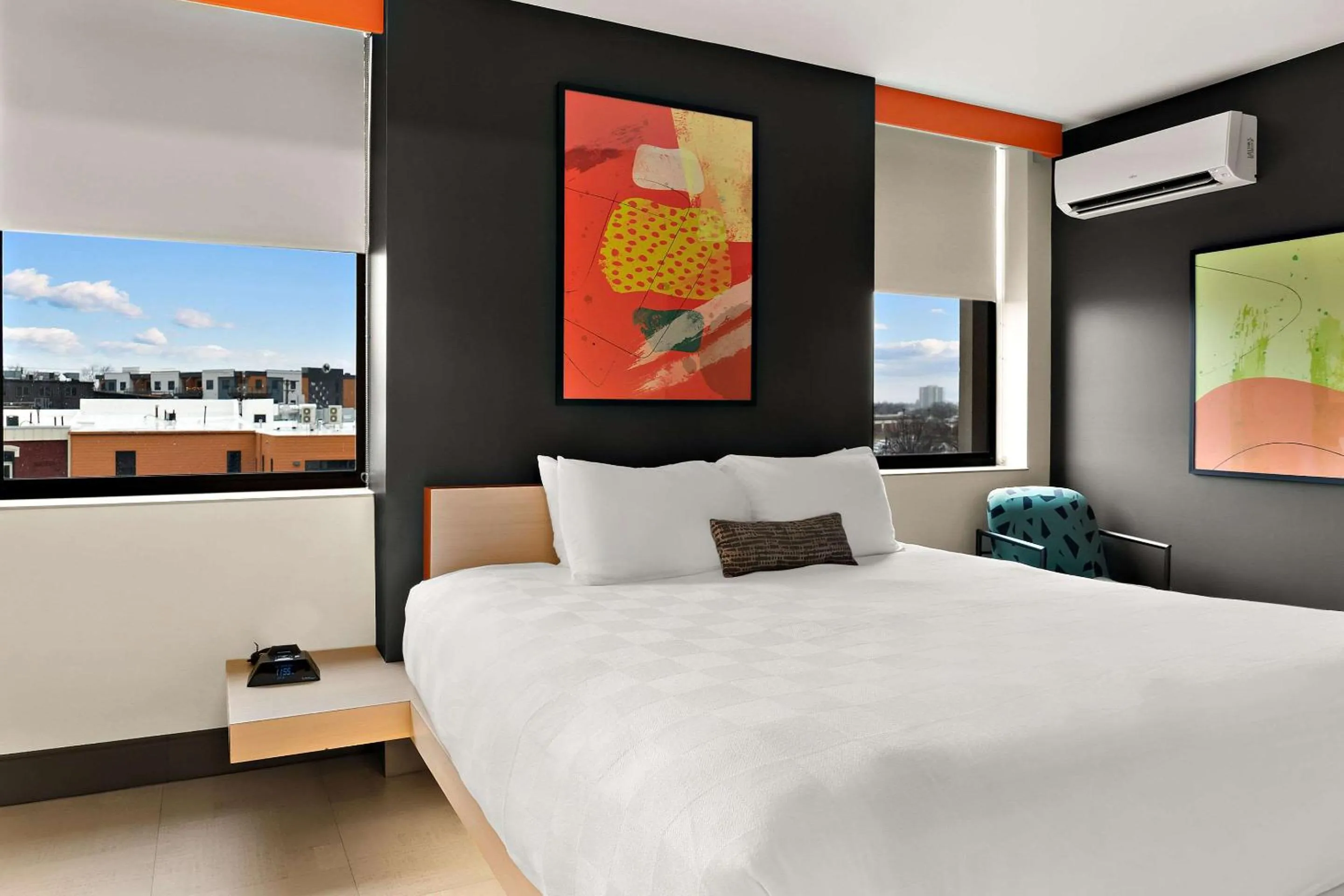 Bedroom in CityFlatsHotel - Port Huron, an Ascend Collection Hotel