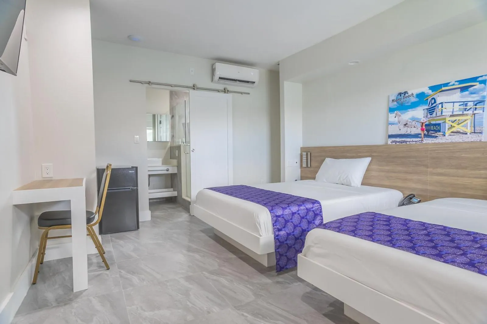 Bed in The Biscayne Hotel