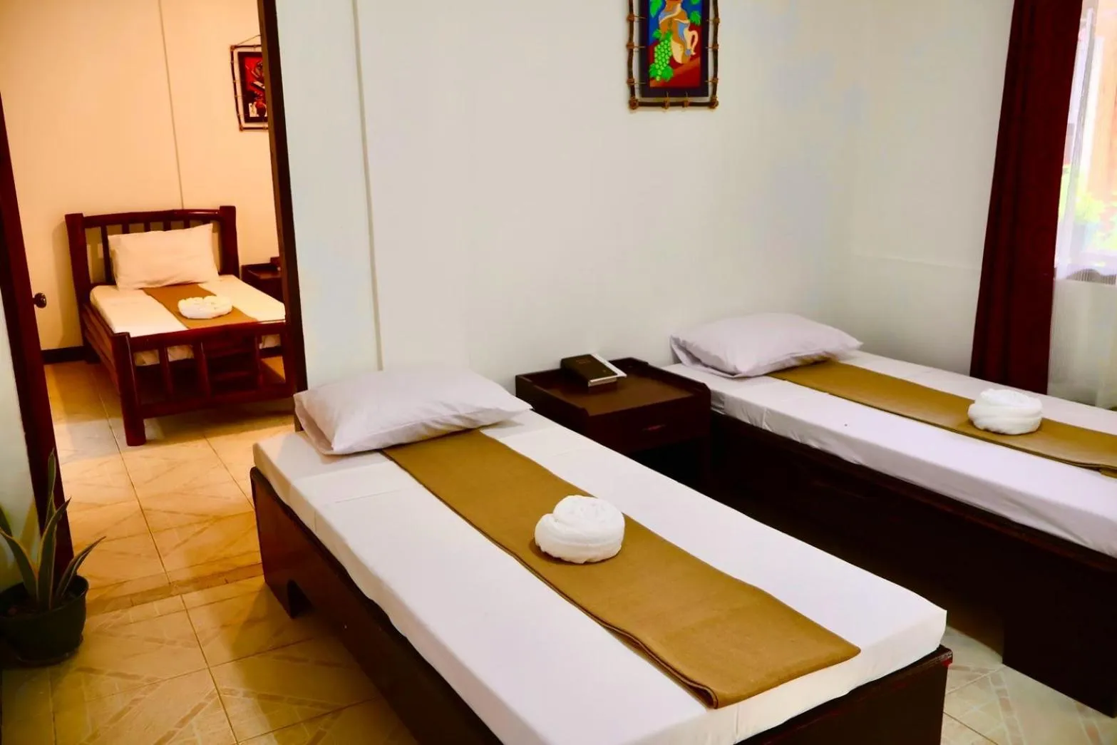 Bed in CHIISAI NATSU RESORT