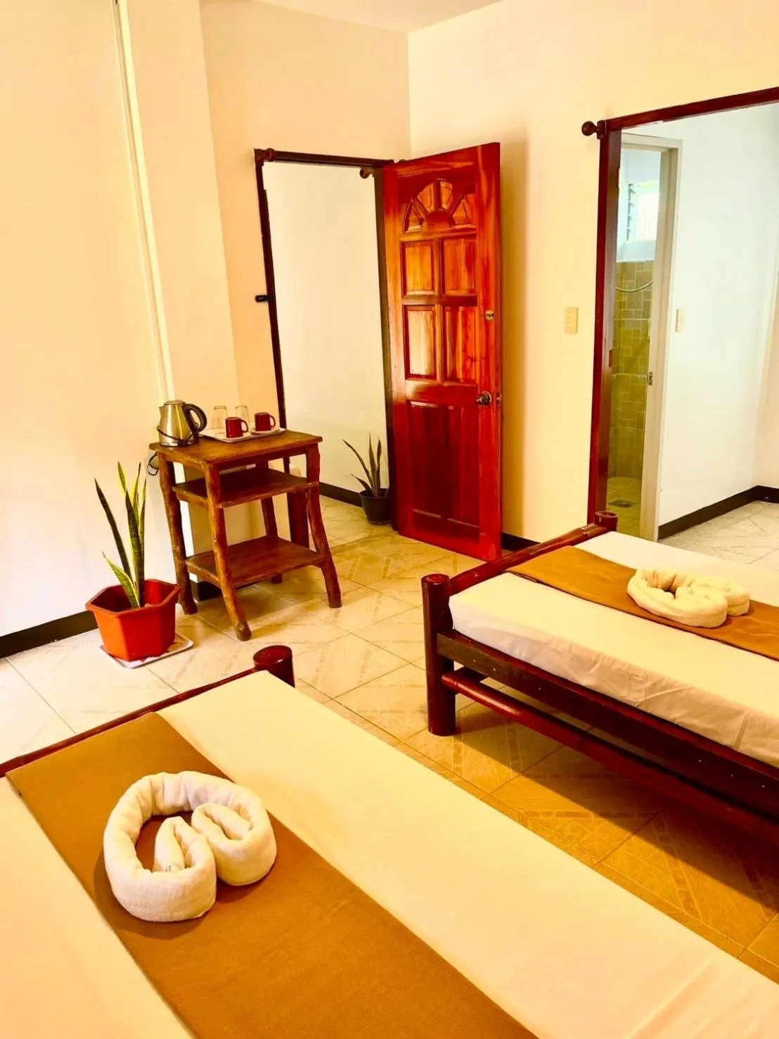 Bed in CHIISAI NATSU RESORT