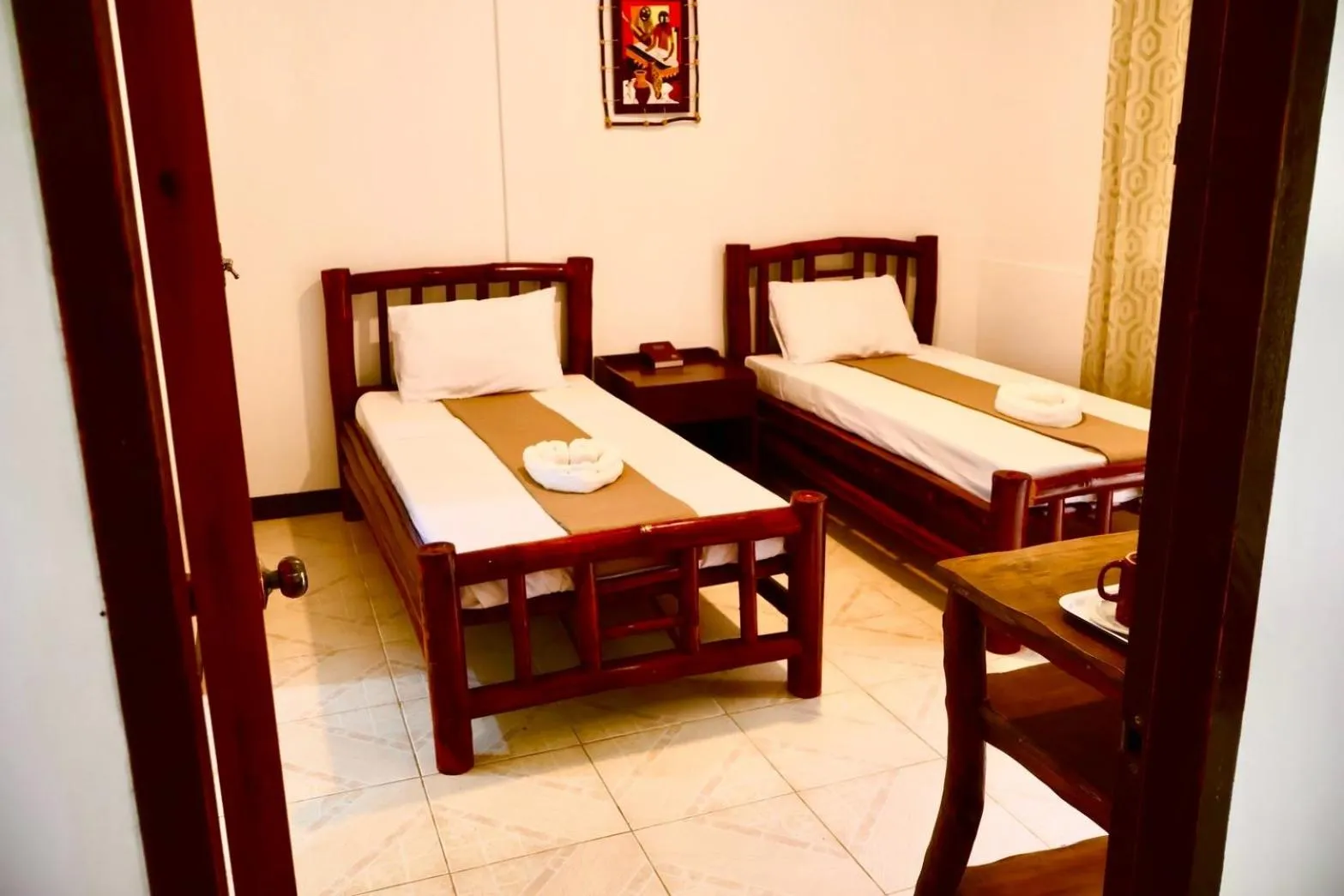 Bed in CHIISAI NATSU RESORT