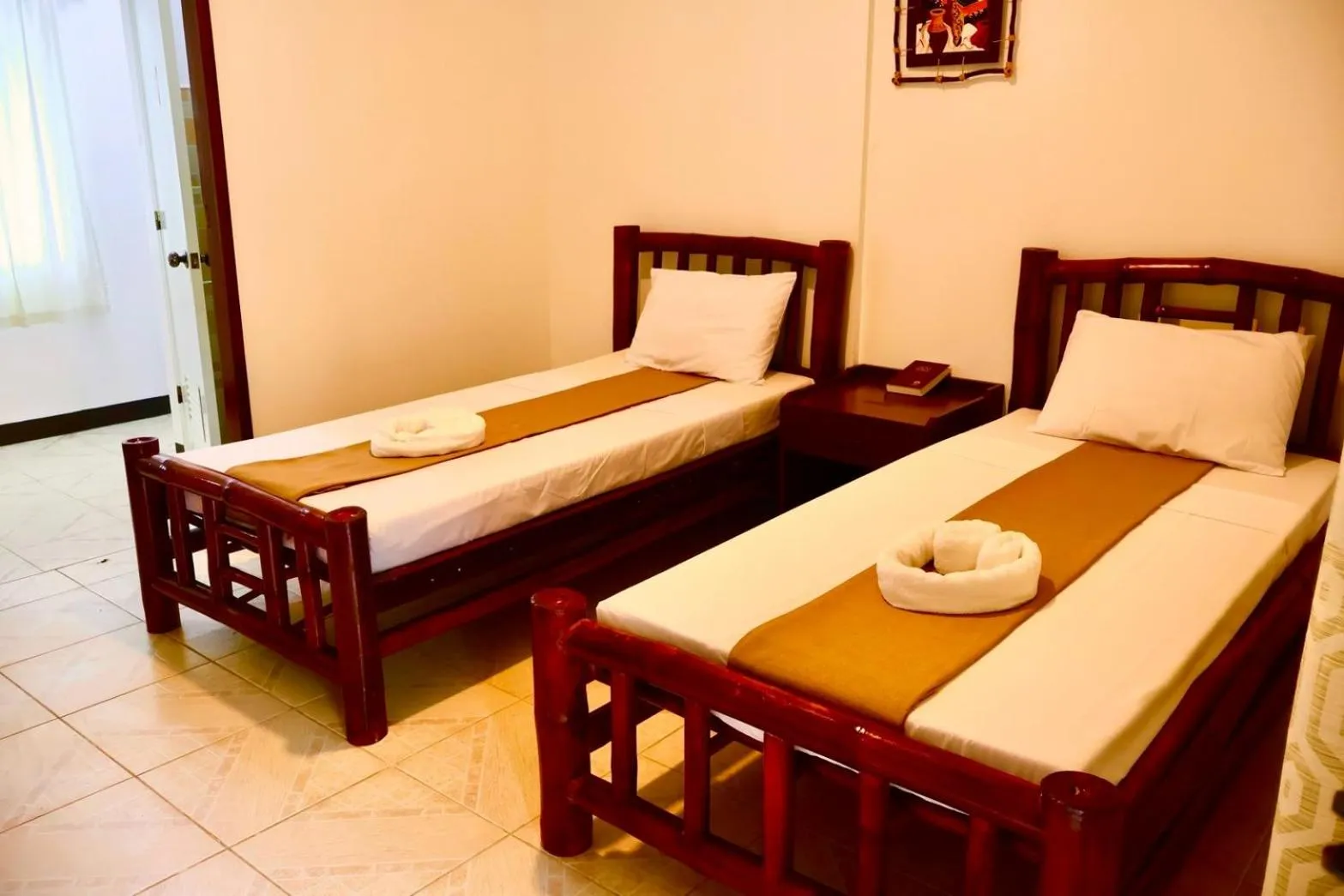 Bed in CHIISAI NATSU RESORT