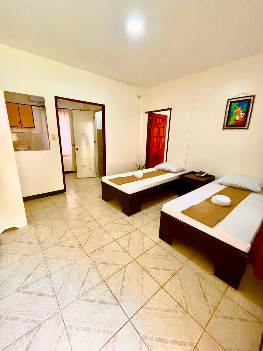 Bed in CHIISAI NATSU RESORT